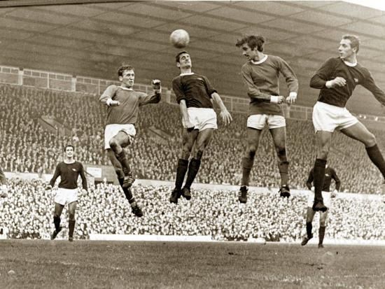 'Manchester United vs. Arsenal, Football Match at Old Trafford, October 1967' Photographic Print ... | Art.com