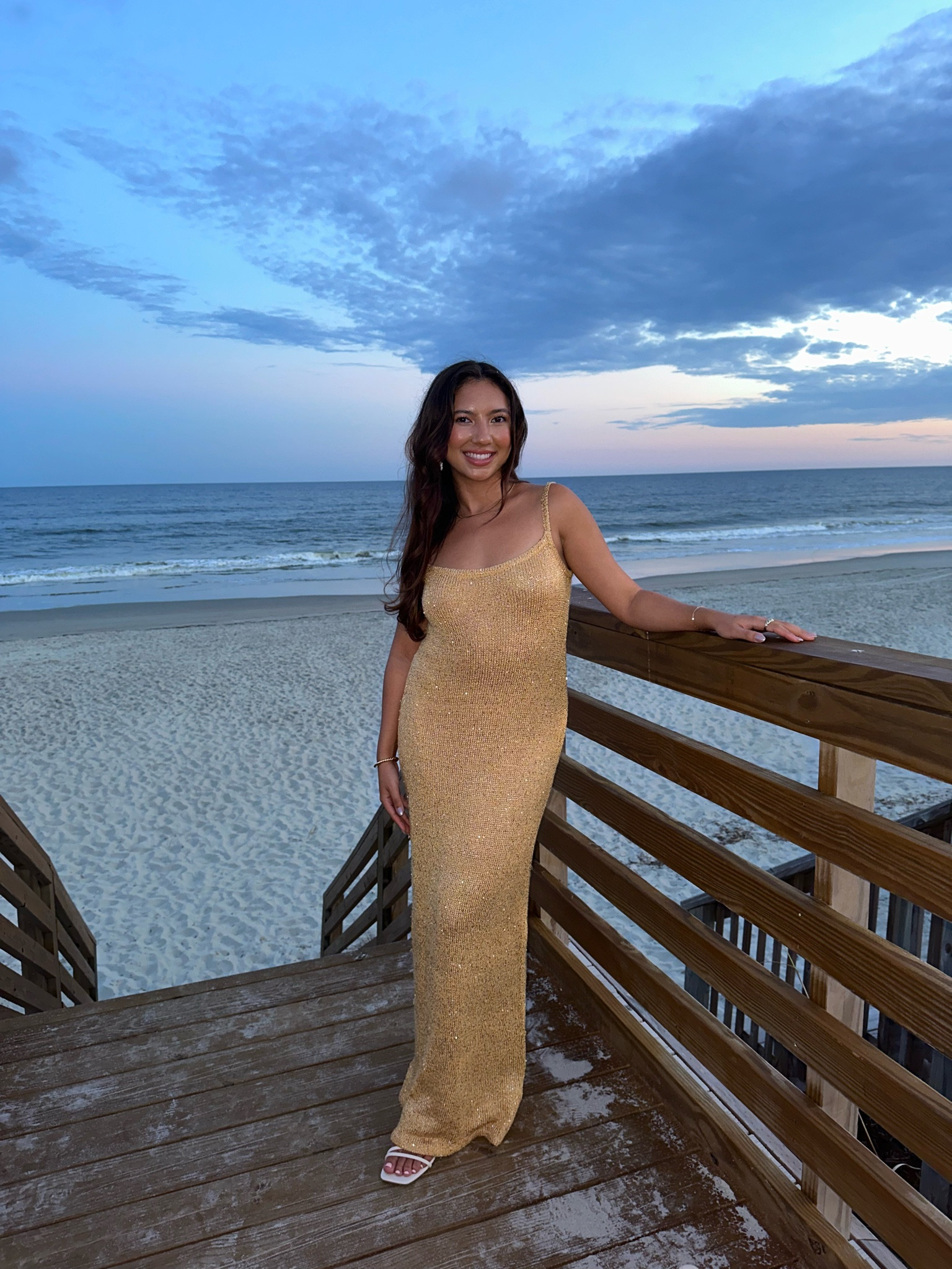 Gold wedding guest dress. Love this because I can wear it for other occasions. Perfect for the beach, summer, and going out. It’s knit with sequins. So flattering. Wearing a size S but it runs big so would size down if you want a more fitted look. 

The dress is 50% off so I linked the other colors and mini length too. 

Shoes are super comfy too and come in 3 colors. I sized up a half size for more comfort since they’re strappy  

#LTKwedding #LTKfindsunder50 #LTKfindsunder100