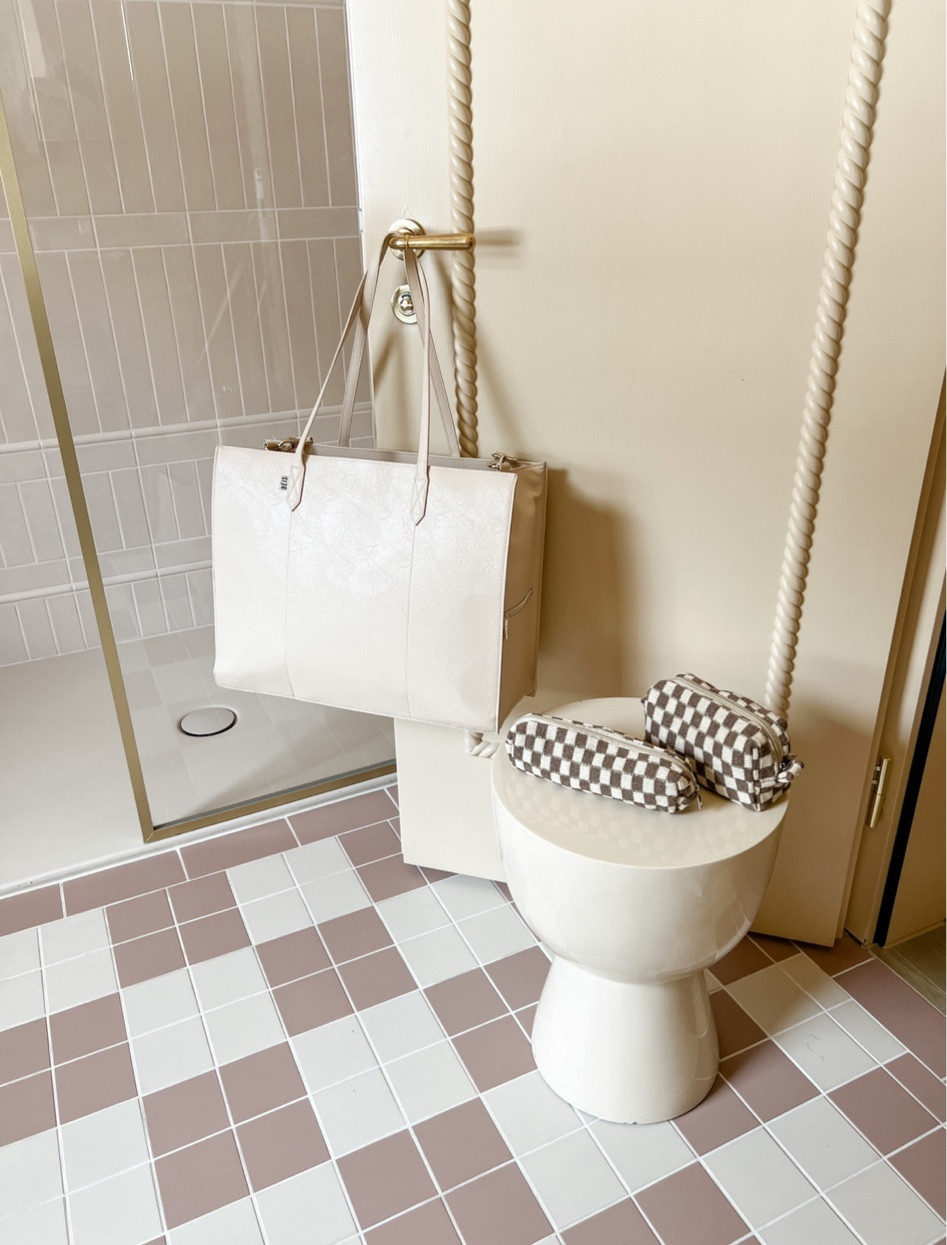 The absolute best bag to use as a personal item or carry on when traveling. It’s like a Mary poppins bag it fits SO much and it has a trolley pass through so it sits right on top of you rolling luggage. It also has a padded shoulder strap!

#LTKtravel #LTKitbag #LTKFind