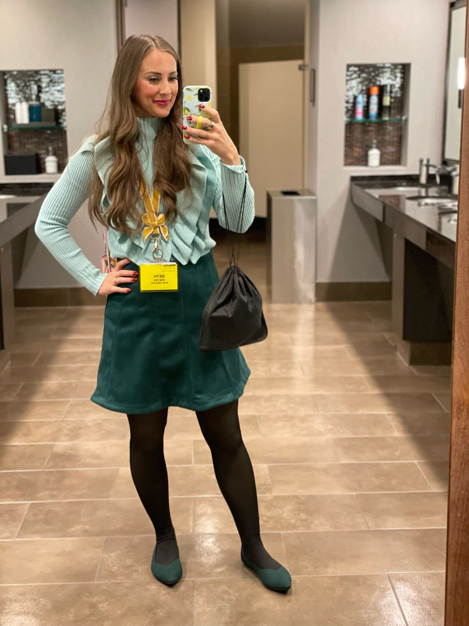 I love this Amazon sweater sooooo much!  It is so soft and the ruffles make me so happy!

This skirt is on sale for $35, and these tights are FLEECE LINED.  Size up!

Headset bag not included 🎧

#LTKSeasonal #LTKWorkwear #LTKFindsUnder50