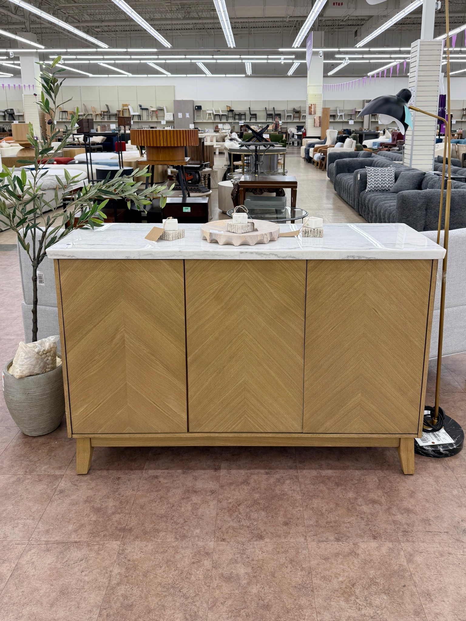 Clean, modern, and beautifully detailed! 😍 The Mairenn Marble Top Server is such a standout with its sleek marble top and warm burnished blonde wood finish. The chevron (herringbone) pattern adds just the right amount of visual interest while keeping the overall look refined and timeless. ✨ Soft-close, hardware-free doors maintain that streamlined profile, with adjustable interior shelving for hidden, practical storage. A stunning choice for a dining room, hallway, or as a statement accent piece anywhere you want modern elegance with texture! 🙌🏻 #ModernFurniture #Wayfair #HomeInspo

#LTKHome #LTKSaleAlert