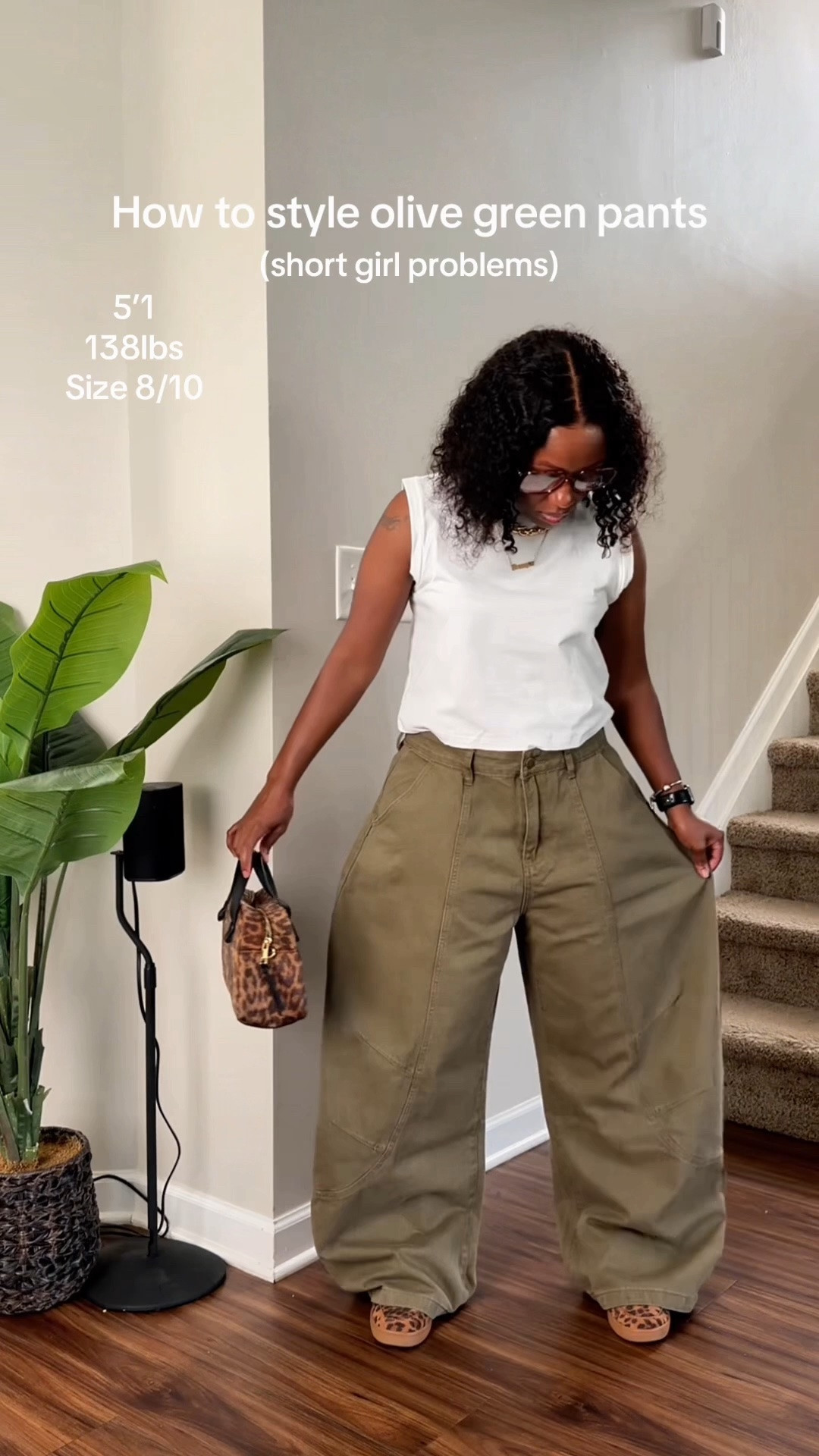 Looking for an easy olive green pants outfit for fall? I styled these relaxed olive pants with a simple white cropped top, leopard sneakers and a matching leopard bag for an easy casual fall outfit.

#LTKootd #LTKOver40 #LTKPetite