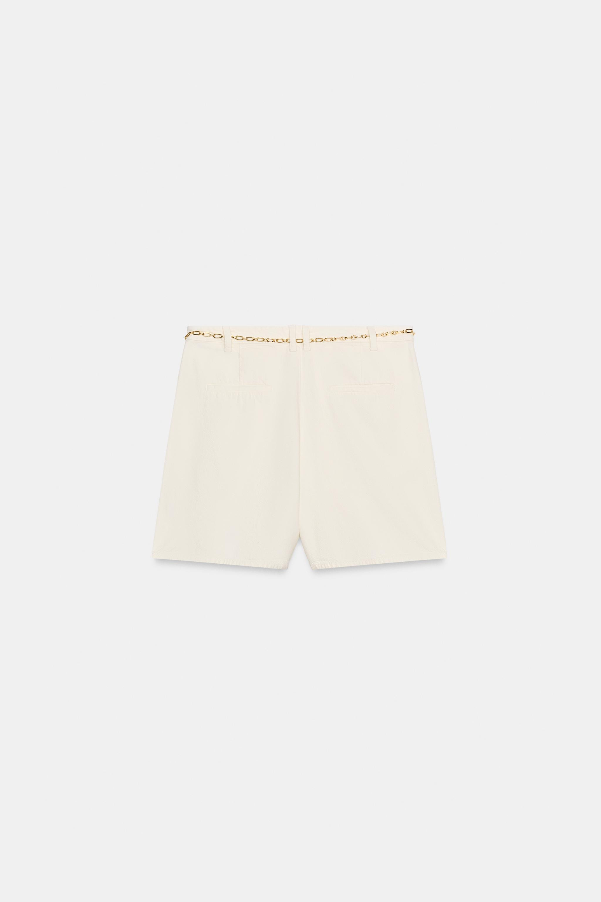 High-waisted Bermuda shorts with front pleats and chain belt. Front pockets and faux back welt po... | Zara US