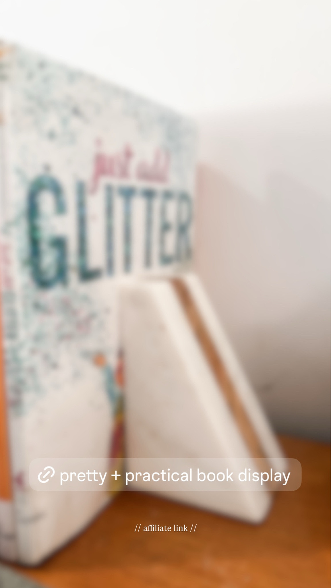 I got this beautiful wood & marble set of bookends for our table behind our couch so that I can set out our library books and keep them within easy reach for everyone in the family. I also plan to set out our seasonal books for the kids.

#LTKHome