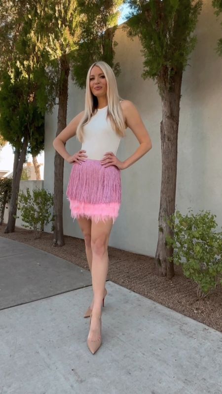 Two darling looks from @shoplovestoryboutique coming at you! #ad whether you want a simple look with sneakers or fun and flirty look (this the pink skirt with bodysuit) for Valentine’s Day

Tank dress
White sneakers
White bodysuit 
Pink feather sequin skirt
Nude heels
Galentines Valentines Day Look



#LTKstyletip #LTKSeasonal #LTKunder100