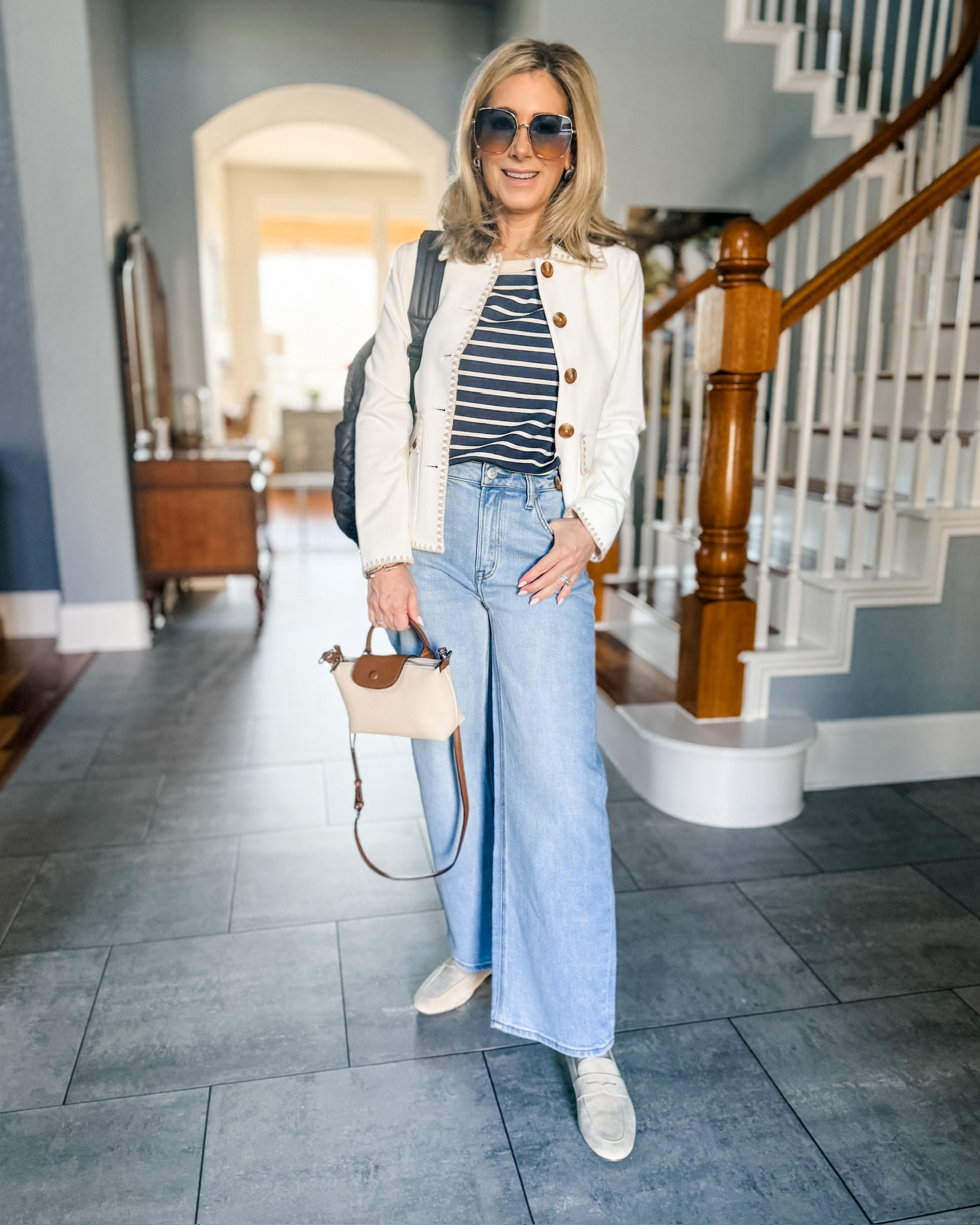 I wore this outfit to accompany my husband and younger son to an indoor golf simulator and then make a grocery store run.  I brought along a backpack with my laptop, headphones and work stuff so I could edit this week’s video while they virtually played a round of golf for two hours. I am so glad I decided to put together an outfit instead of throwing on loungewear because I ran into one of you at the grocery store! That was the cherry on top of a lovely, relaxing yet productive day! 

Now on to the outfit details…these are a new to me Jean style from @onequince. They’re a relaxed straight leg and the material has a nice weight to it. Comes in two washes and inseam lengths. I’m in between sizes so I sized up one. I LOVE the double scuba knit fabric on this top. I think it’s going to be a spring outfit staple for sure. The knit jacket is selling out quickly-if you’ve been considering it, grab it before it’s gone and while it’s on sale!

#springoutfit #fashionover50 #denim #straightlegjeans #coastalchic #knitjacket #chicos #quince 



#LTKStyleTip #LTKOver40 #LTKItBag