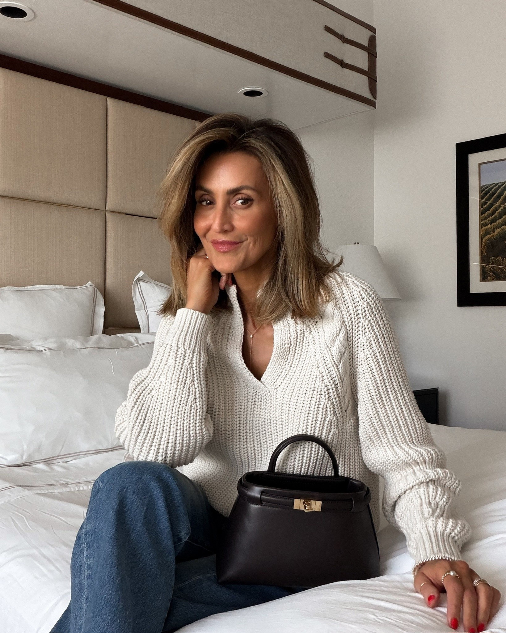 This travel outfit carried me through the rest of my day. The unique knit + jeans that stayed comfortable and held their shape were the perfect combo. I cannot recommend these jeans more for travel!

#LTKTravel #LTKootd #LTKOver40