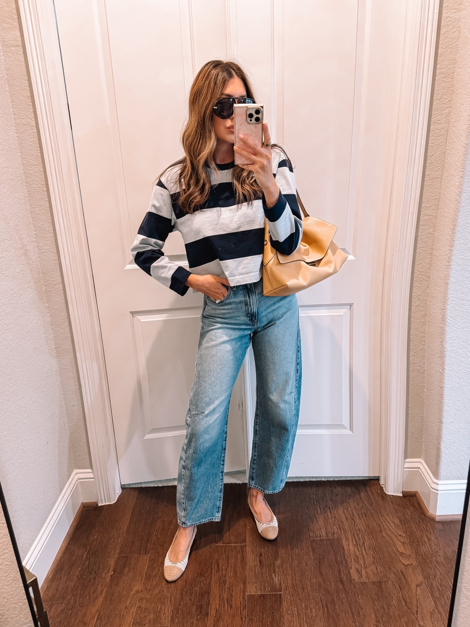 Medium in top, size 26 in jeans (both under $100)