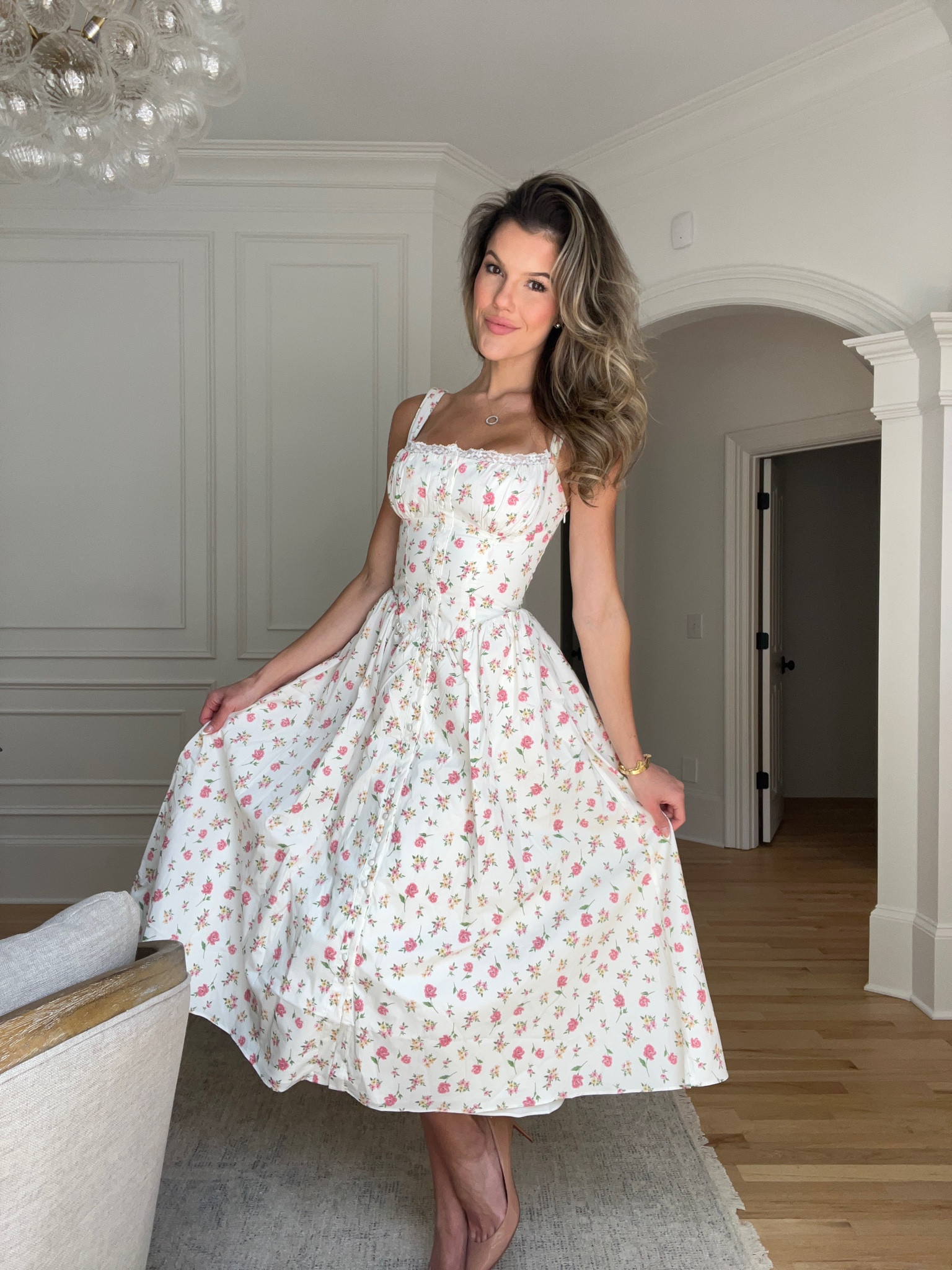 This milk made sundress has adjustable straps and the corset in the back + the zipper on the side. I am wearing a size small in this one, but I’m going to size down to an extra small.