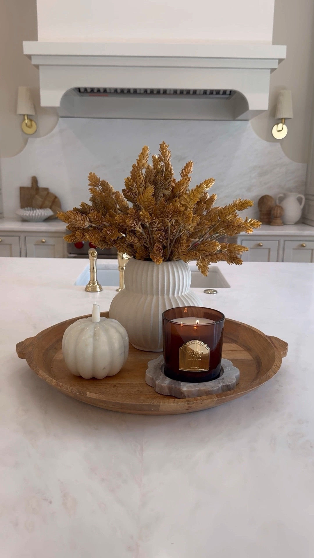 Fall centerpiece idea that is perfect for your kitchen island! I love these gorgeous stems (I used two in my vase) and this vase has been a huge hit—it looks so high end but is super affordable.  The marble pumpkin is the perfect touch and I love the smell of this candle—so good! 

#LTKHome #LTKSeasonal #LTKVideo