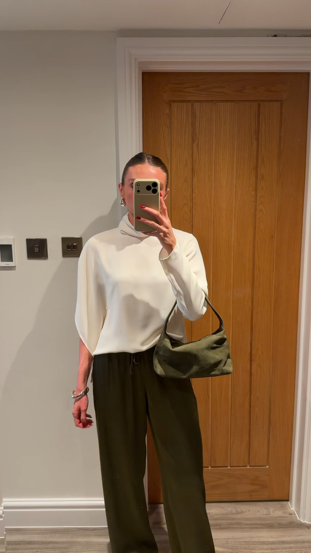 Outfit of the night 
Mango asymmetric blouse  I wear the size medium
Abercrombie satin khaki green trousers I wear the extra small long and I’m 5 foot six in height
And other Stories black leather ballet flats
ASOS green suede bag
M&S silver earrings
Karen Mellon silver bangle, older similar linked
