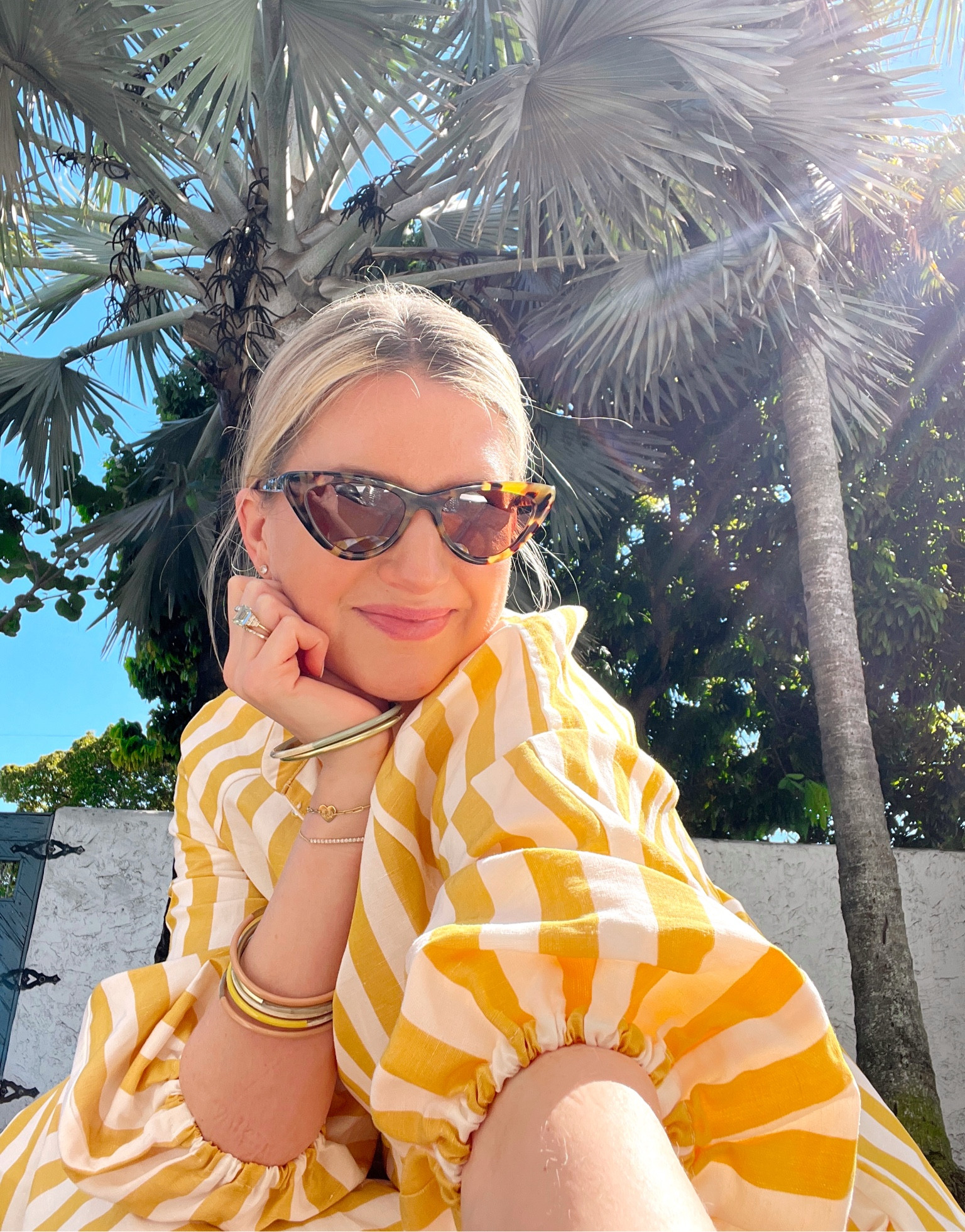 The prettiest, yellow and white, striped caftan, cat eye, sunglasses, and easy to wear bangles. 

#LTKtravel #LTKSeasonal #LTKswim
