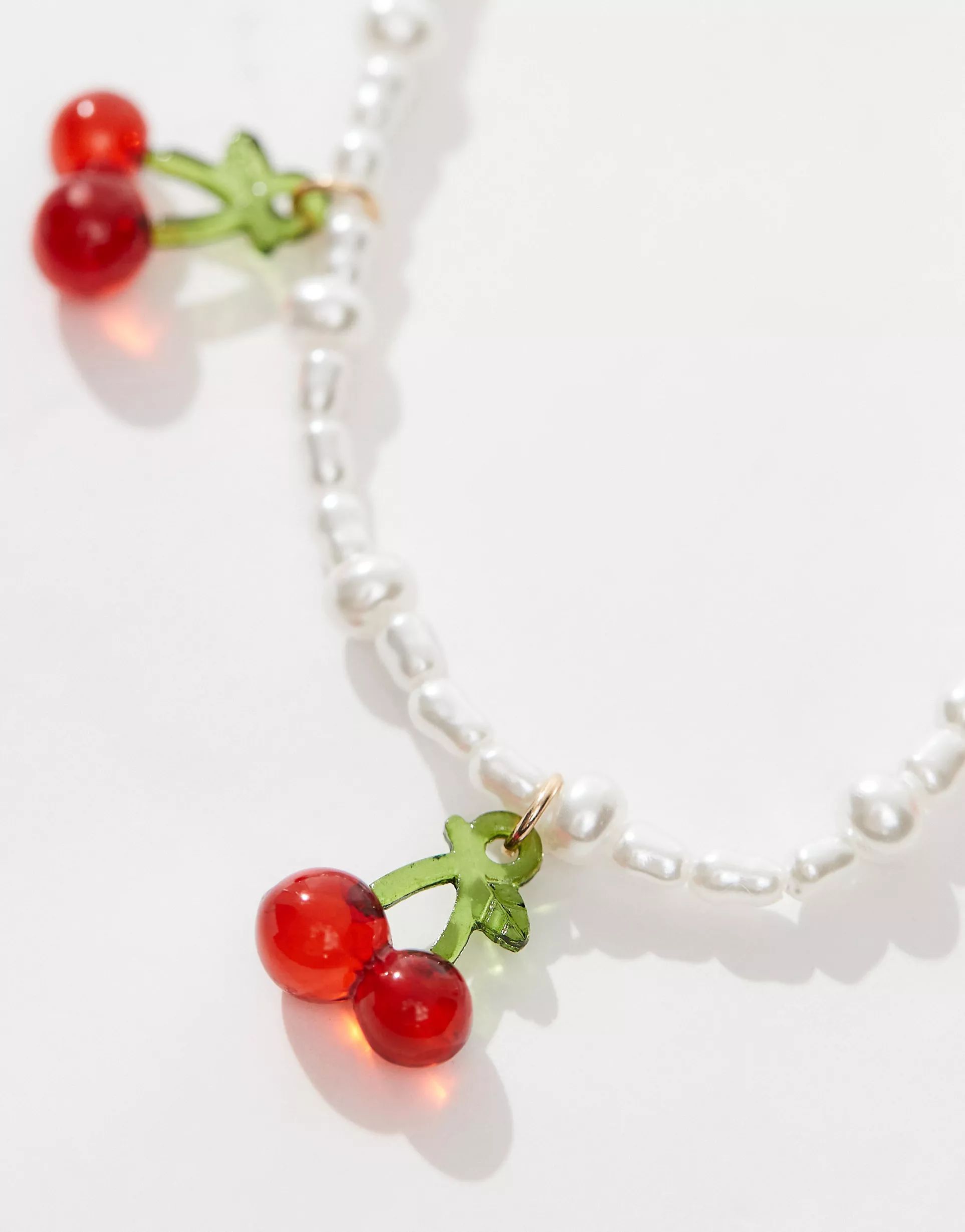 ASOS DESIGN necklace with faux freshwater pearl and triple red cherry design | ASOS (Global)