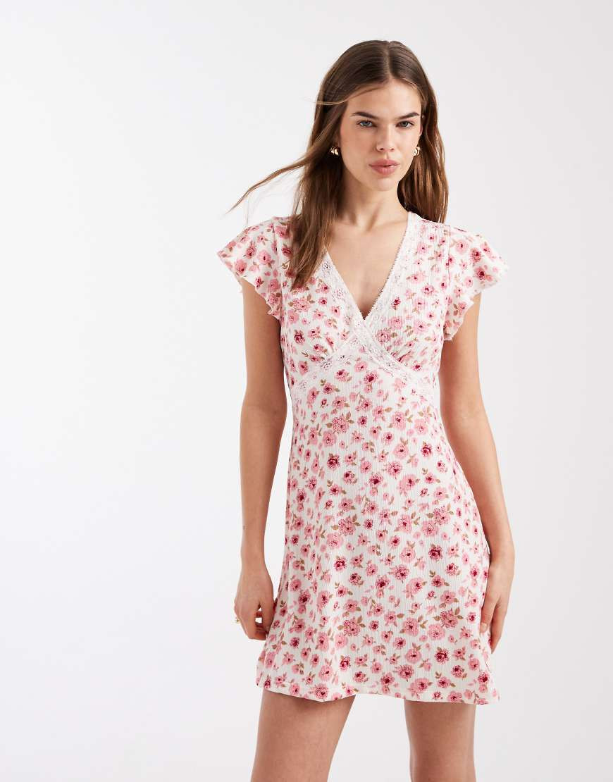 New Look lace trim flutter sleeve mini dress in pink ditsy floral | ASOS (Global)