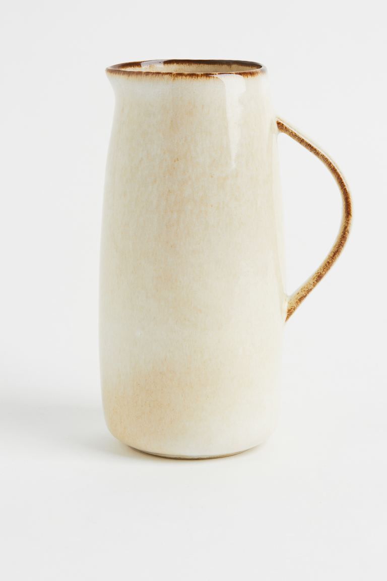 Pitcher in glazed stoneware with a handle and spout. Diameter 5 in. Height 8 3/4 in. Reactive gla... | H&M (US + CA)