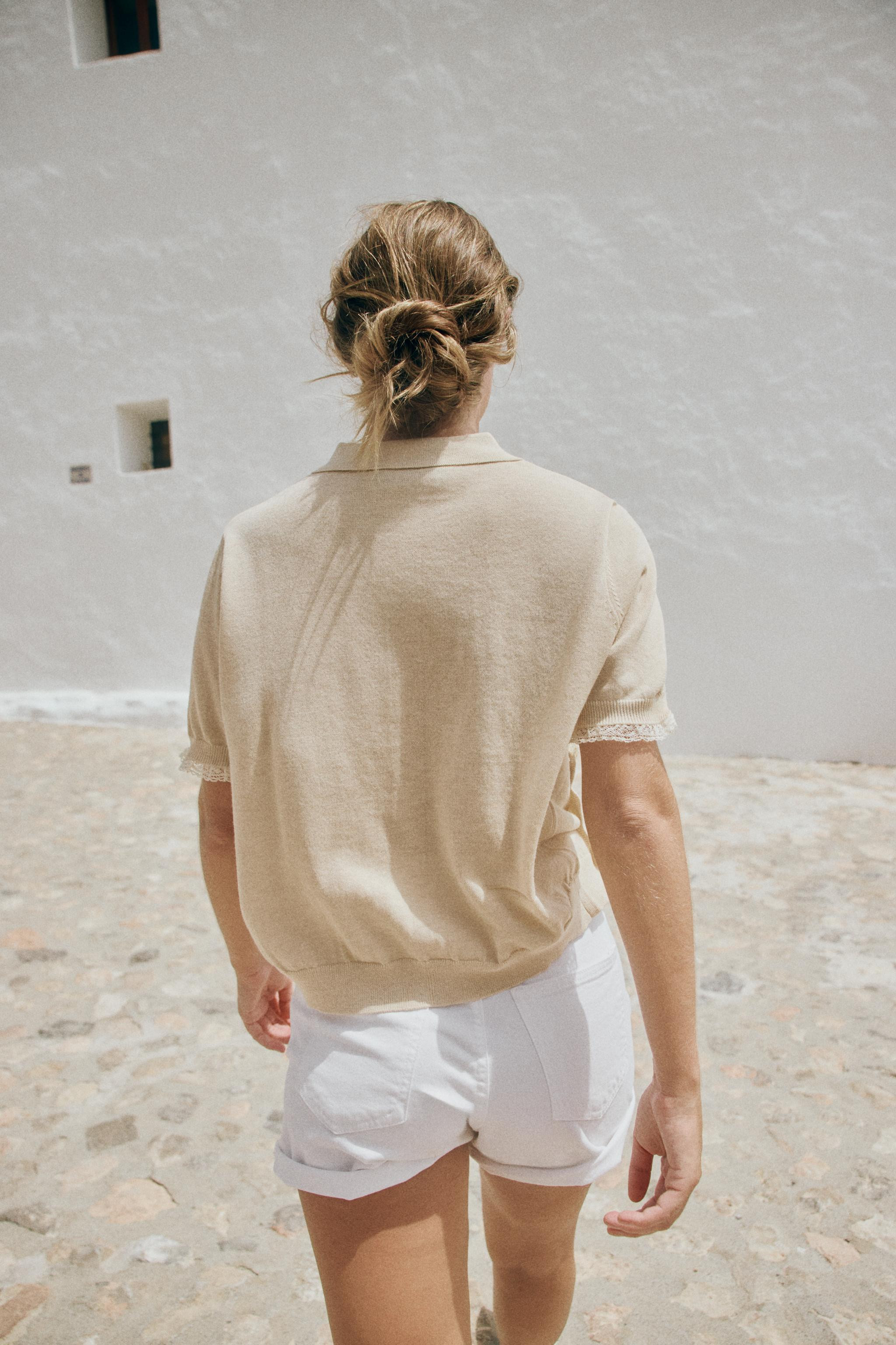 Cardigan with a polo collar and short sleeves. Finished with lace trims. Front button fastening. | Zara UK