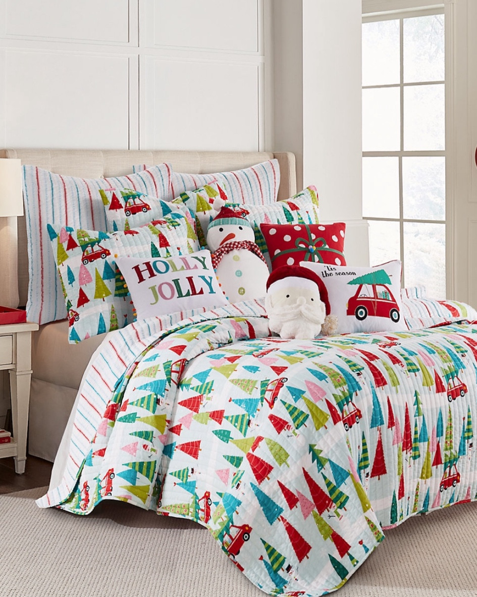 This bedding is perfect for fun and festive holiday bedrooms and guest rooms. It features bright and colorful pine trees and whimsical holiday prints. Options include matching sheets, comforter or quilt, pillowcases, shams, and decorative throw pillows. Many other beautiful bedding sets are available and the throw pillows would be perfect on sofas too. These are already a great price, but use code SAVE20NOW for 20% off this amazing deal.

#LTKsalealert #LTKhome #LTKHoliday