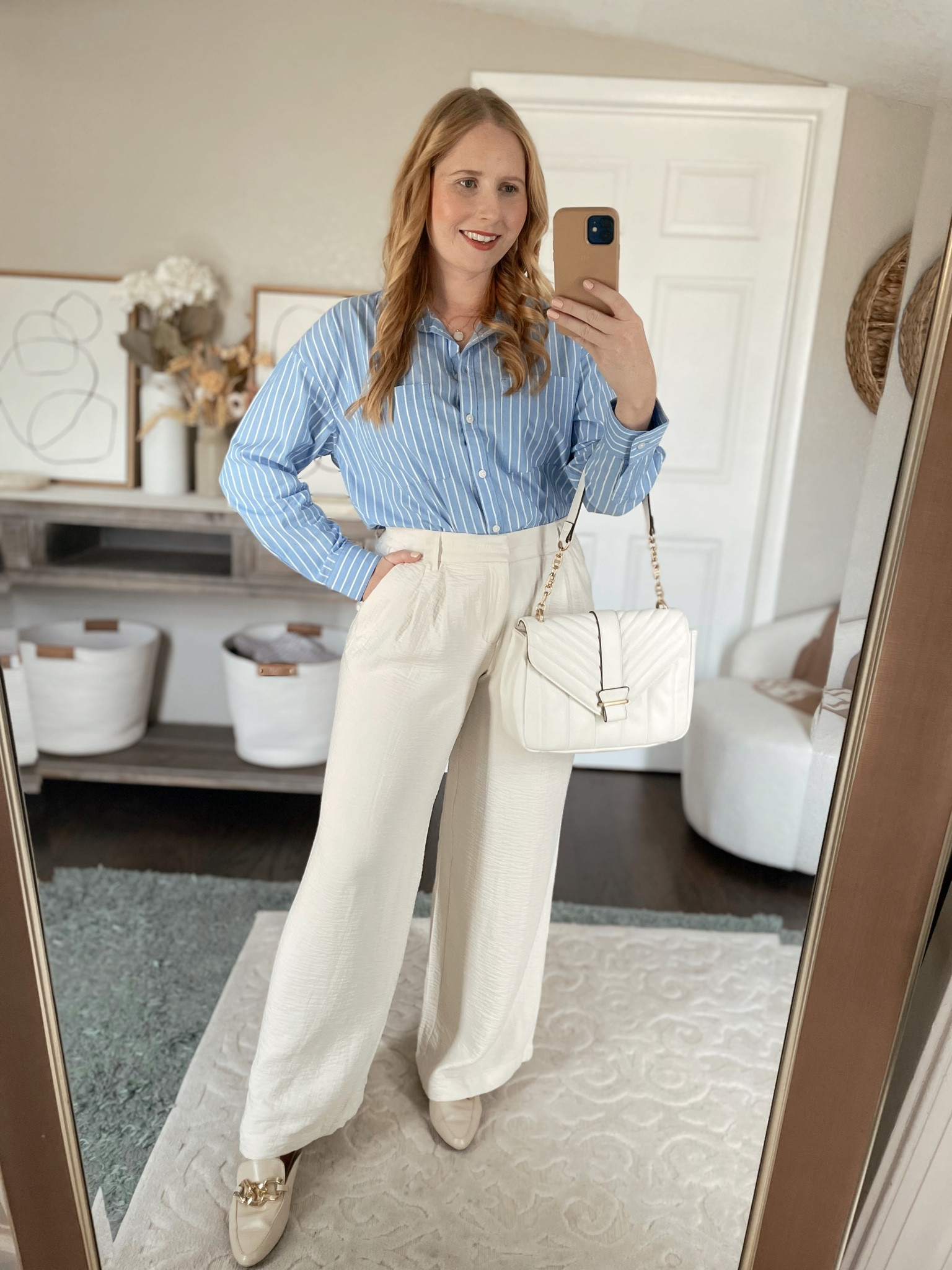 Styling wide leg trousers for the office! Love these cream wide leg trousers Affordable by Amanda wears a size 8 (size down 1) with a blue striped button down shirt from old navy (size M) 

#LTKFind #LTKworkwear #LTKunder50