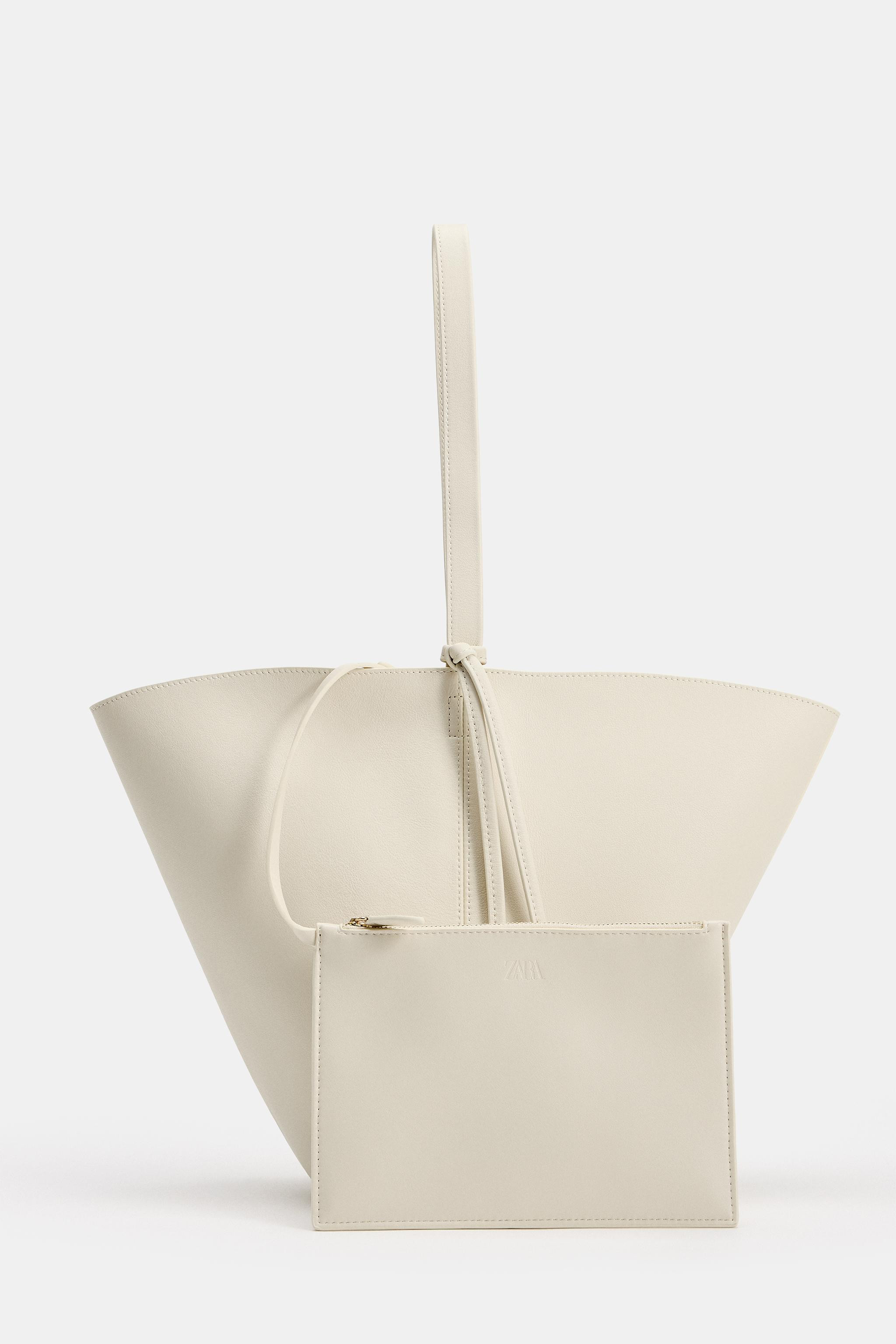 Model height: 178 cmLeather shoulder bag. Top features contrasting colour and material stitching ... | Zara UK