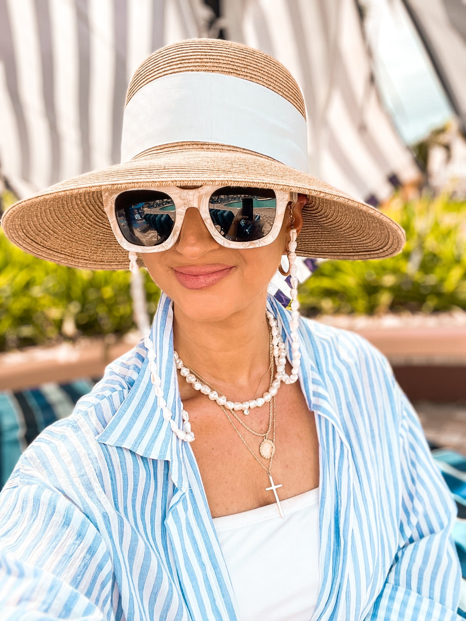 Womens large white sunglasses 
Womens sunhat with white bow
Blue and white striped linen button up swim cover up shirt 
Seashell sunglasses holder
Womens white ribbed one piece swimsuit-medium 
Gold cross necklace
Gold guardian angel necklace
Gold round rhinestone necklace 