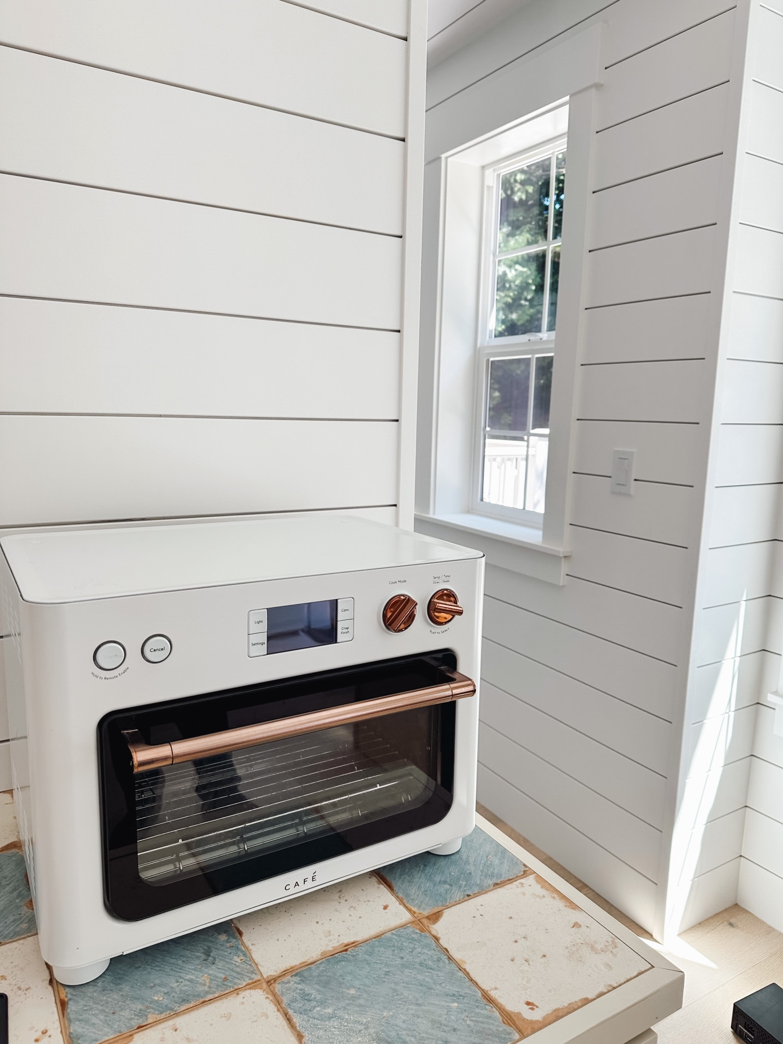 Tiny cottage sources: Toaster oven / air fryer combo (white and copper), and blue and white checkered tile 

#LTKhome #LTKFind #LTKstyletip