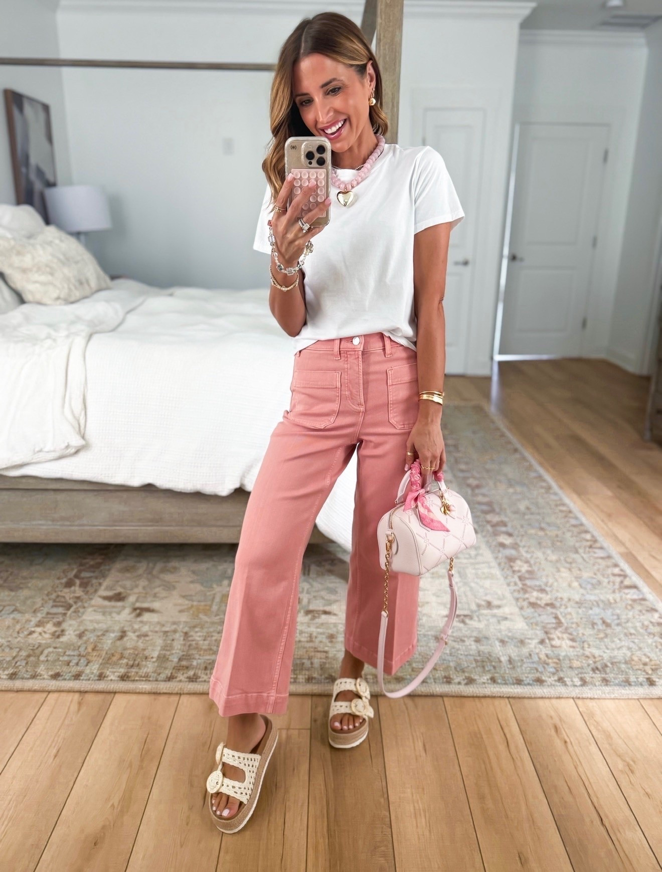 My spring outfit of the day. Summer outfit. Elevated casual. Mom outfit. I love this Spanx wide leg latch pocket jeans! Medium compression. Code LISAMARIEXSPANX on first time orders. Wearing XS petite. Could size down if in-between sizes. XS in cotton t-shirt. Beaded heart necklace. Target buckle slide sandals.

#LTKootd #LTKgrwm #LTKPetite