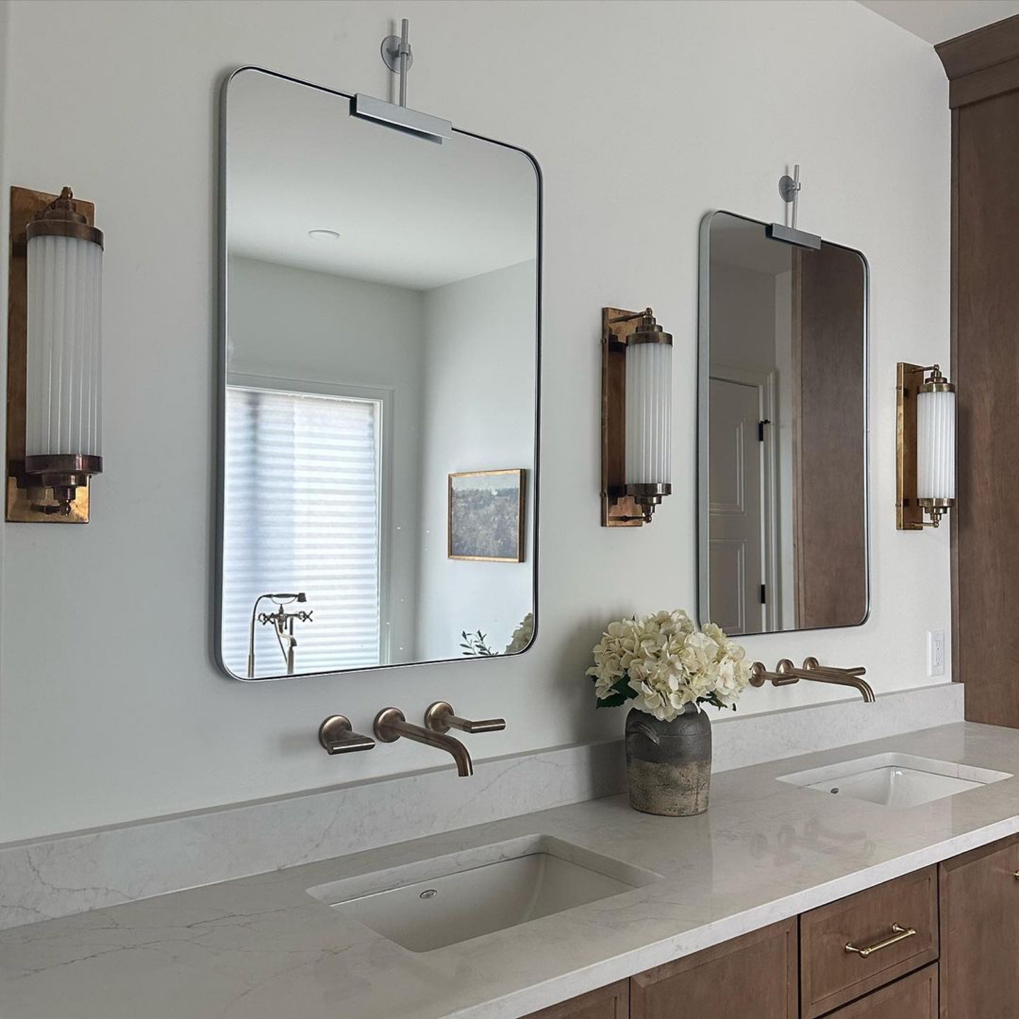 Vintage brass bathroom sconces!

#LTKhome