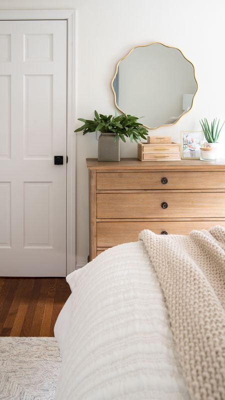 Bedroom refresh with wood dresser, gold scalloped mirror, artificial plants, white comforters, and quilts, throw blankets and more coastal style home decor


#LTKfamily #LTKhome