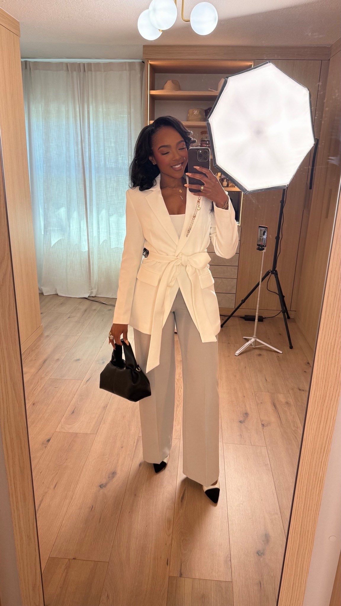 Scroll to shop 🤍 A belted blazer layered over a sleek base with tailored wide-leg trousers for a polished, boss-energy look that’s perfect for meetings, events, or an elevated day out.  

#LTKWorkwear #LTKPetite #LTKdayinmylife