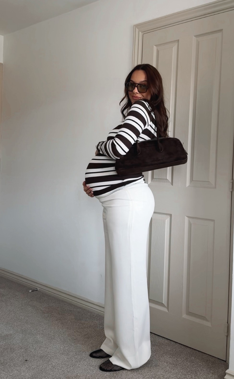 A smart/casual outfit at 34 weeks pregnant 🤎🤍 

Trousers - Kookai (Maria elasticwted waist), I wear a uk size 8 

Top - I wear a size M 

Bag - Limé (I’ve linked similar) 

Sunnies - Vehla (I’ve linked similar) 

#LTKmaternity #LTKspring