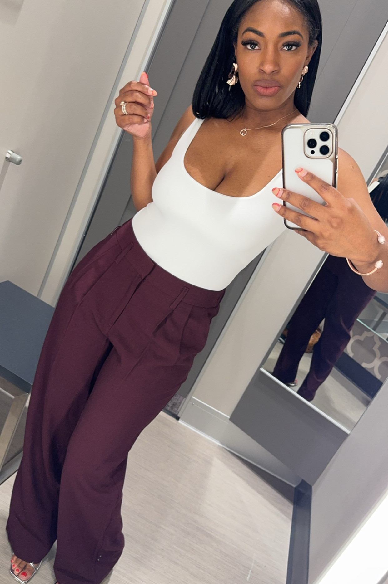 White seamless tank and burgundy work pants 

#LTKWorkwear #LTKFindsUnder50 #LTKStyleTip
