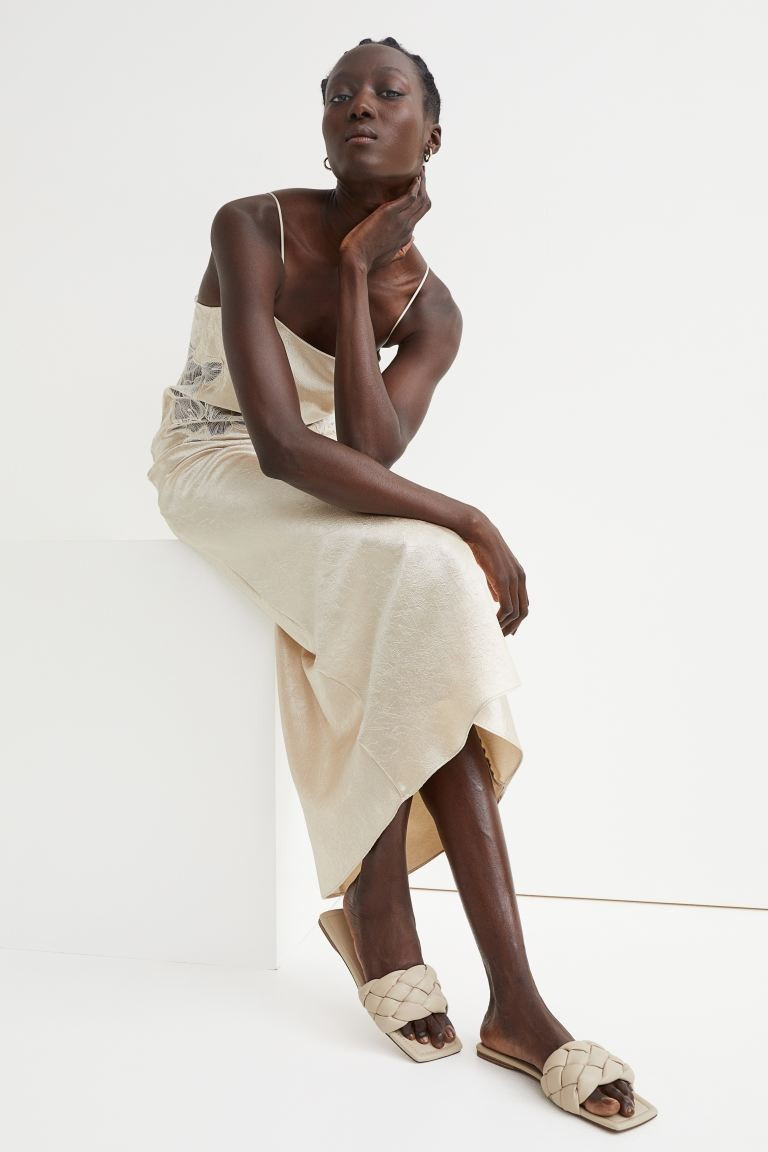 Slides in faux leather with a wide, braided foot strap and open, square toes. Faux leather lining... | H&M (US + CA)