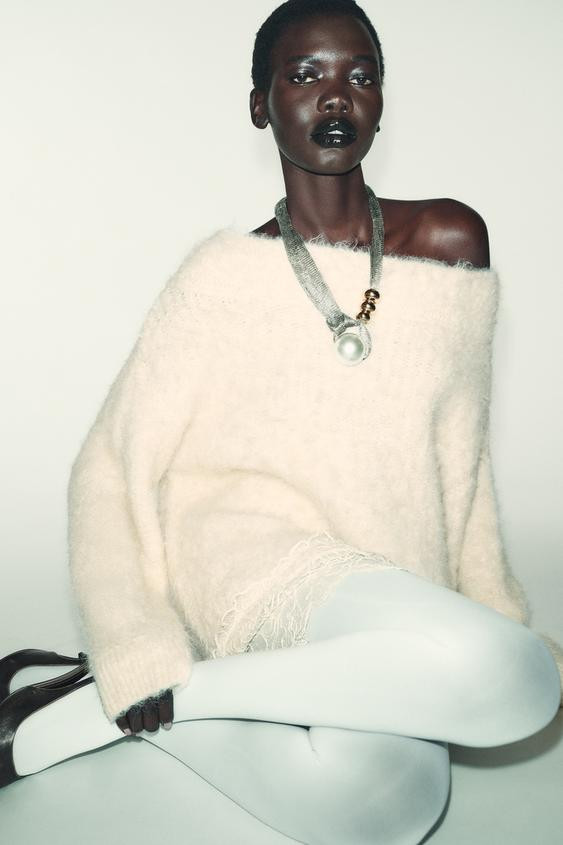 Double metal mesh necklace with a knot. Metallic ball pendant in different sizes with contrasting... | Zara US