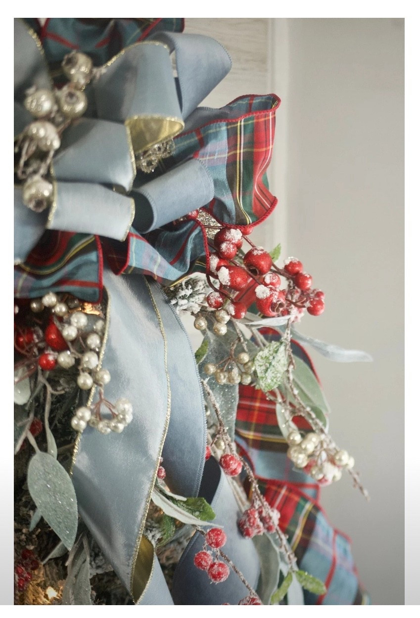 🎀 Luxury Plaid & Dusty Blue Tree Topper Bow

This stunning handcrafted tree topper is the ultimate showstopper for a classic, elevated Christmas tree 🎄✨ The mix of rich tartan plaid, silky dusty-blue ribbon, gold edging, frosted berries, and luxe designer velvet creates the most beautiful layered look. It feels high-end, timeless, and completely custom — the kind of topper that transforms your entire tree into a designer masterpiece.

The oversized loops, mixed textures, and frosted greenery give that luxury boutique aesthetic without needing a professional decorator. If you’re going for classic Christmas charm, Ralph-Lauren-inspired colors, or a soft blue holiday palette, this topper is absolutely gorgeous and worth the splurge 💙🍒🌿✨

⸻

dusty blue christmas ribbon • luxury tree topper bow • plaid tree topper • tartan christmas decor • classic christmas tree • designer holiday decor • blue and plaid christmas • ralph lauren inspired holiday • frosted berry picks • elegant christmas decorations • boutique tree topper • velvet ribbon bow • holiday home styling • elevated christmas tree decor

#LTKHome #LTKHoliday