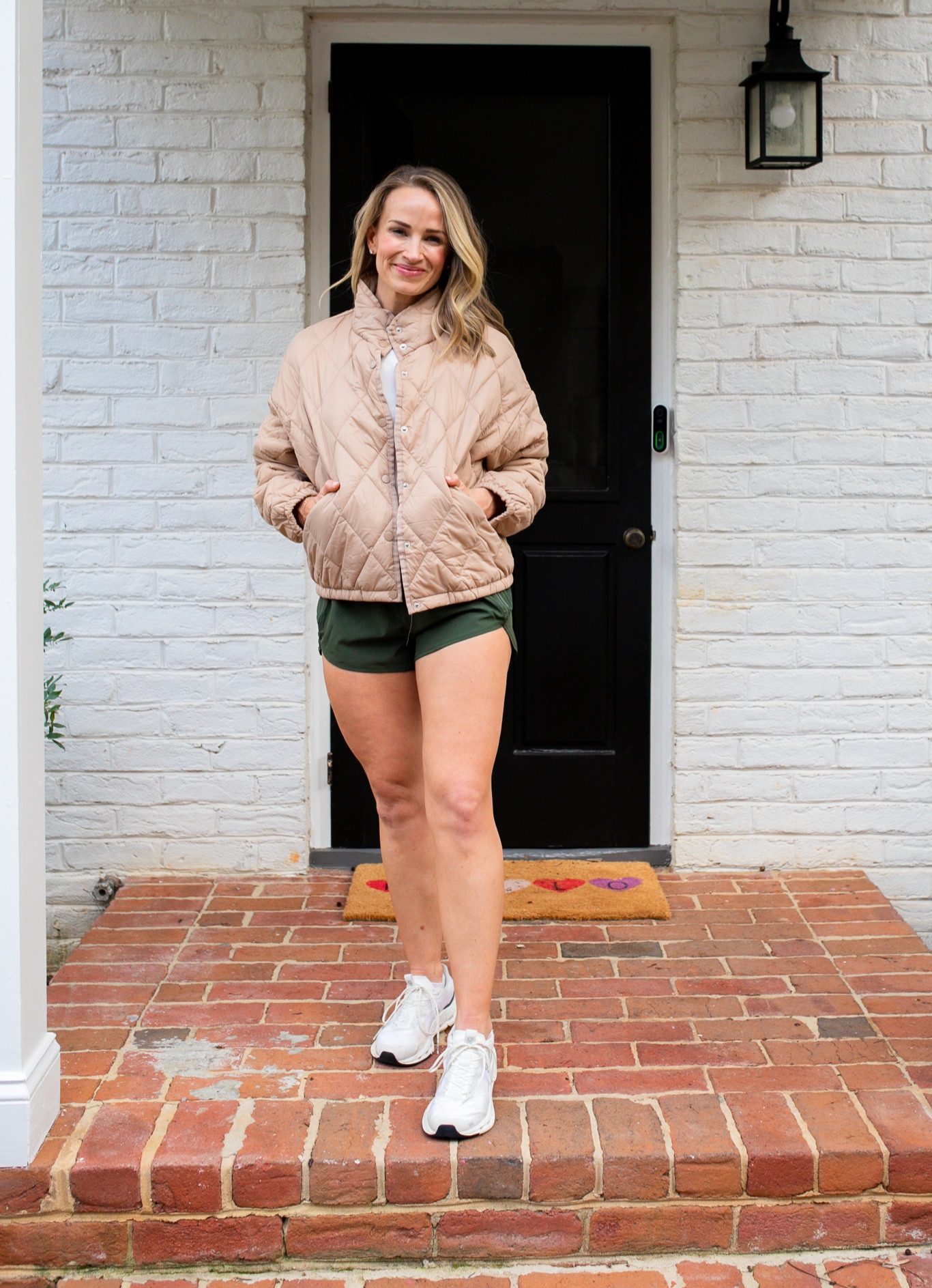 Amazon athleisure outfit: Quilted puffer coat (XS), green running shorts (size S), and cropped workout tank (XS) and my favorite white on cloud sneakers. 

#LTKshoecrush #LTKFind #LTKunder100