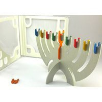 Beautiful Multicolored Steel Hanukkah Menorah Coming in Compact Disc Casing | Etsy (US)