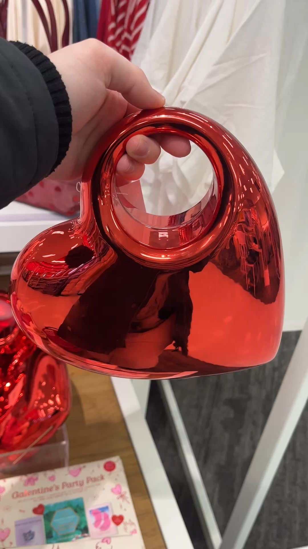 Okay but this plastic heart-shaped red chrome clutch is giving main-character energy ❤️✨

The perfect statement bag for Valentine’s Day, date night, Galentine’s, or any outfit that needs a pop of bold, glossy glam.

Obsessed with the heart purse trend, this red chrome clutch is lightweight, eye-catching, and instantly elevates even the simplest outfit. Pair it with a little black dress, red heels, jeans and a bodysuit, or a cozy sweater for a chic Valentine’s vibe. It’s the cutest Y2K inspired accessory, perfect for weddings, parties, concerts, nights out, or holiday outfits.

If you love unique handbags, acrylic clutches, heart shaped purses, and trendy statement accessories, this one is a must-have. So fun, flirty, and totally Instagram-worthy 💋

❤️ Valentine’s Day purse
❤️ Heart shaped clutch
❤️ Red chrome handbag
❤️ Statement bag
❤️ Date night outfit accessory
❤️ Trendy handbag
❤️ Y2K purse
❤️ Girls night out bag
❤️ Wedding guest clutch

Linked here 🤍 #LTKfinds #LTKstyle #LTKaccessories #ValentinesDayStyle #HeartPurse #StatementBag #RedAccessories

#LTKValentine #LTKgrwm #LTKootd
