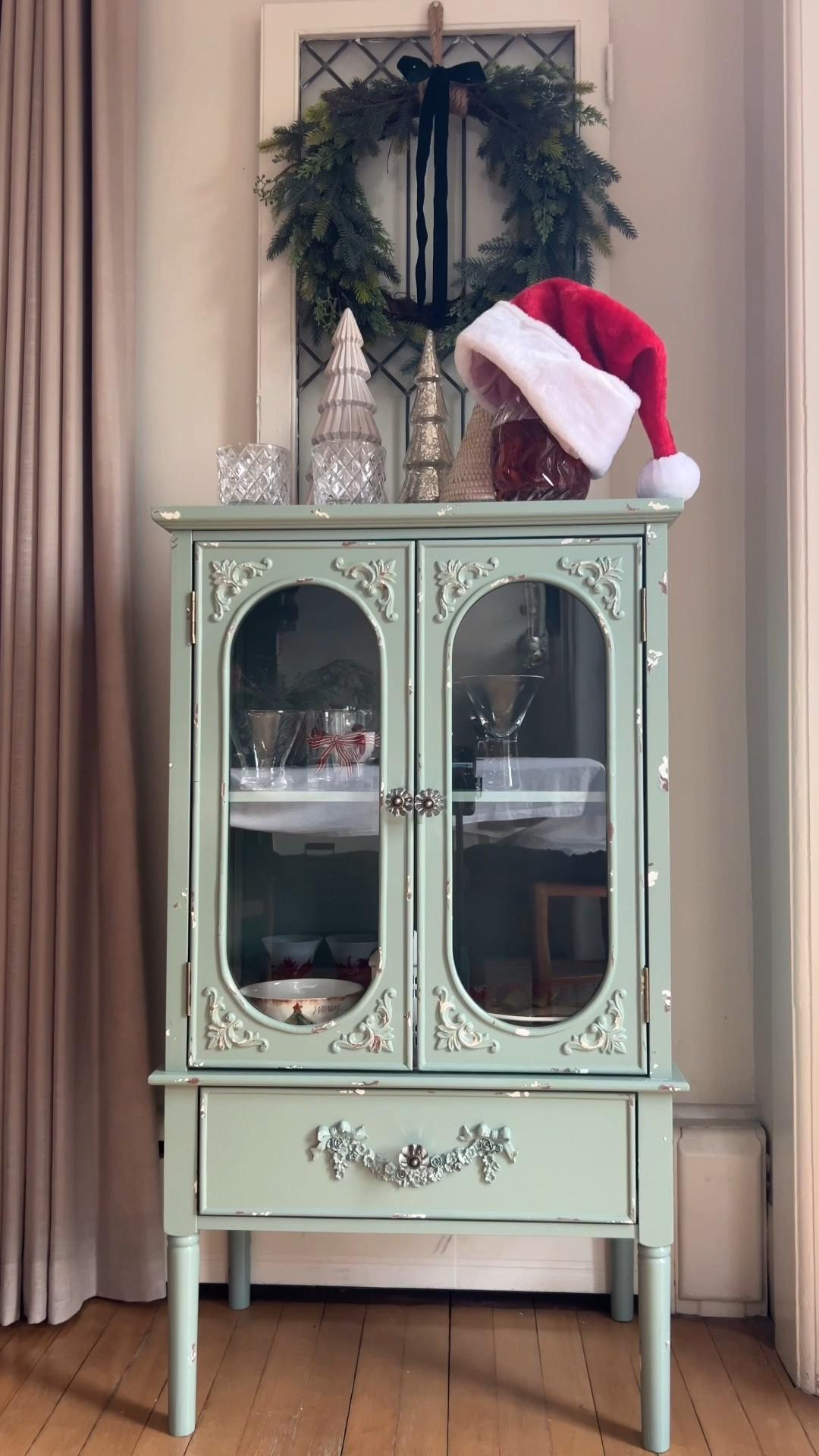 Locked & loaded for when Santa is ready to hang up her hat!  So much behind the scenes magic happens this time of year!  How do you relax when the work is done? 

What would you stock in this cabinet?  Love that it is brand new but looks old!  Perfect for our antique home or our lake cottage!  So many possible uses: a bar, a pie cabinet, extra storage.  Loved that it had everything Santa needed to set the table & to relax when the job was done! ho ho ho! 
.
.
#cabinet #liquorcabinet #chippygoodness #cottagecoreaesthetic #antiquelooking 

#LTKCyberWeek #LTKGiftGuide #LTKHoliday