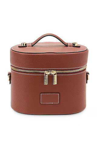 Oval Toiletry Case in Ginger Brown | Revolve Clothing (Global)
