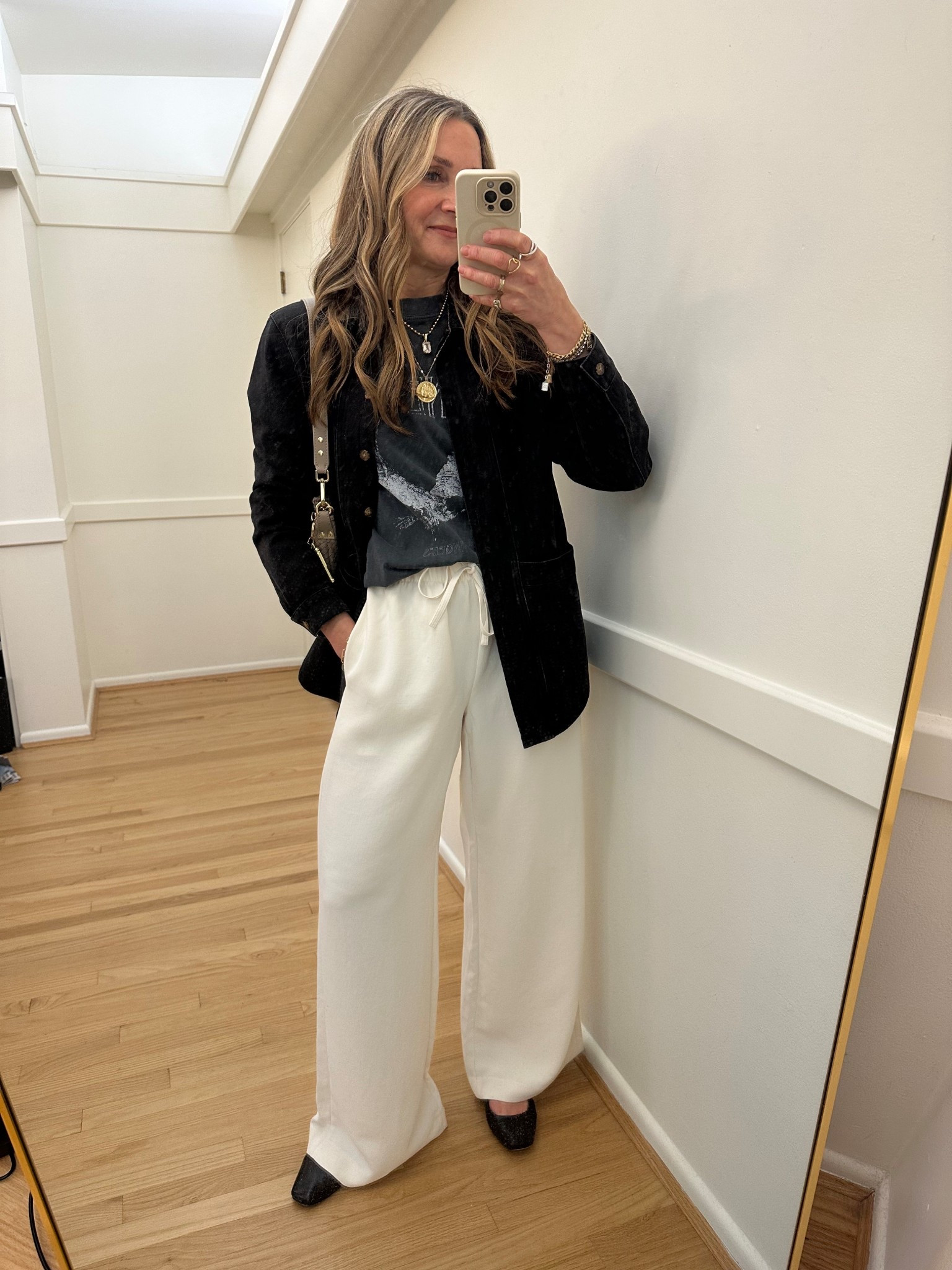 Date night outfit!
Black denim chore jacket with Anine Bing graphic tee and Aritzia Lodge pants (size medium). Quince woven bag and black Mary Jane flats. 

Spring outfit, going out outfit, work outfit office outfit 
#ltkworkwear #ltkover40 #ltkootd

#LTKgrwm #LTKSaleAlert #LTKWorkwear