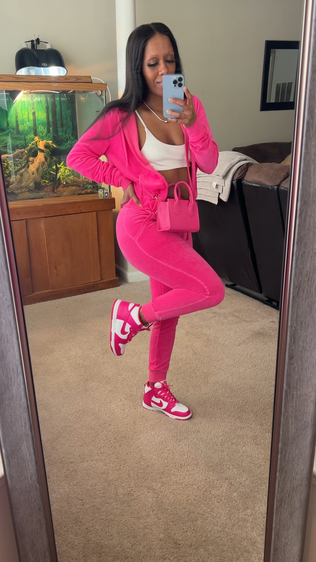 Pink outfit! I’m wearing a pink jacket and pink joggers in a size small. I’m also wearing a white crop top in a size small. I styled this outfit with a pink crossbody bag and pink and white sneakers.

#LTKshoecrush #LTKSeasonal #LTKstyletip