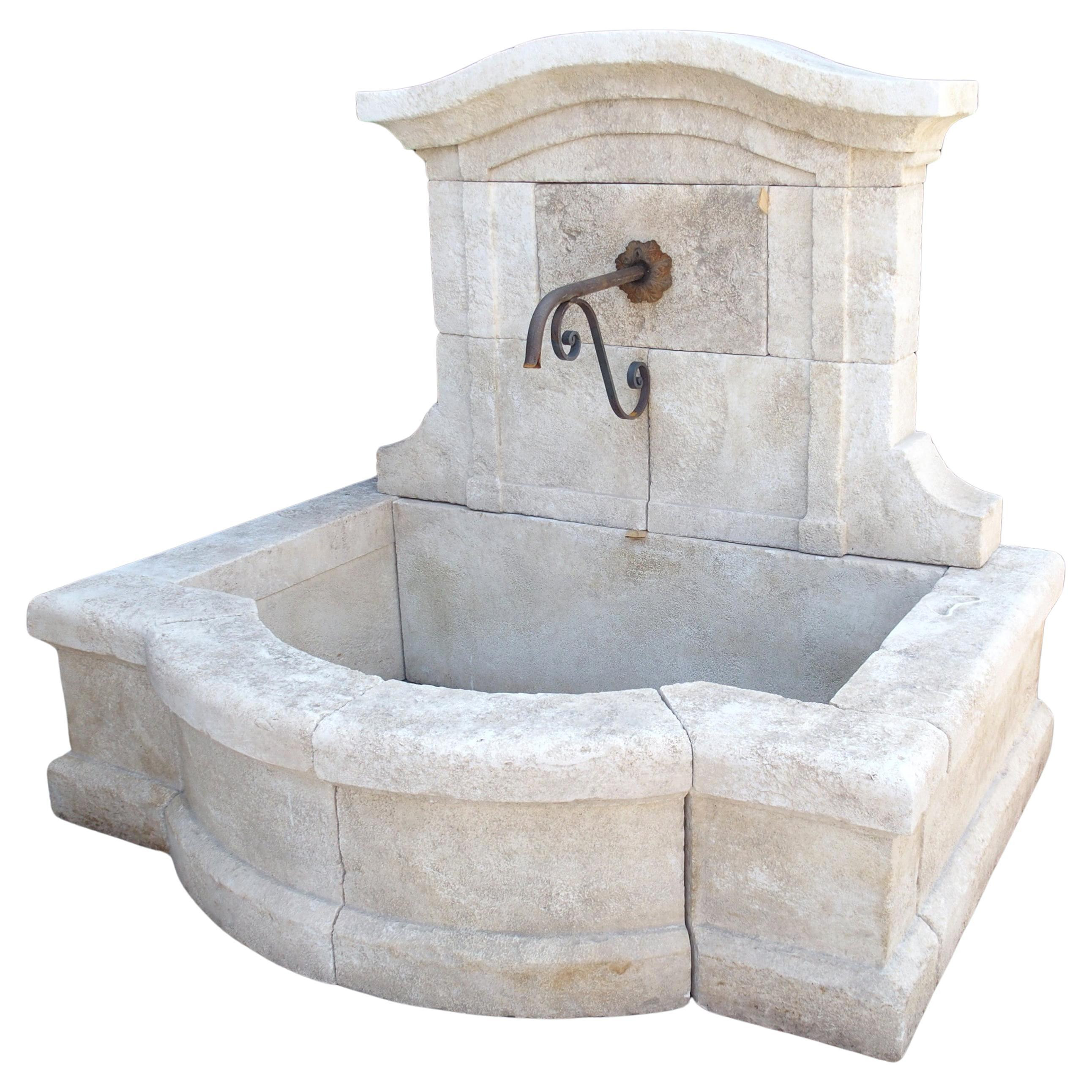 Coustelet French Carved Limestone Wall Fountain with Arched Top and Basin | 1stDibs