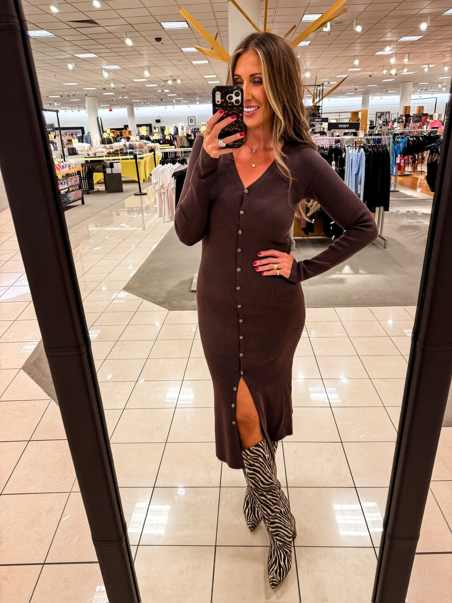 I tried this dress on expecting a simple fall knit, but the fitted ribbing and full button front made it feel so much more interesting. The deep chocolate brown is easy to style, and the zebra boots add just enough personality for dinner, an event, or a night out.

Size M, boots fit tts

chocolate brown dress, ribbed midi dress, button front dress, fall date night outfit, zebra print boots, fitted knit dress, fall fashion, statement boots, over 40 style, themominstyle

#LTKootd #LTKSeasonal #LTKOver40