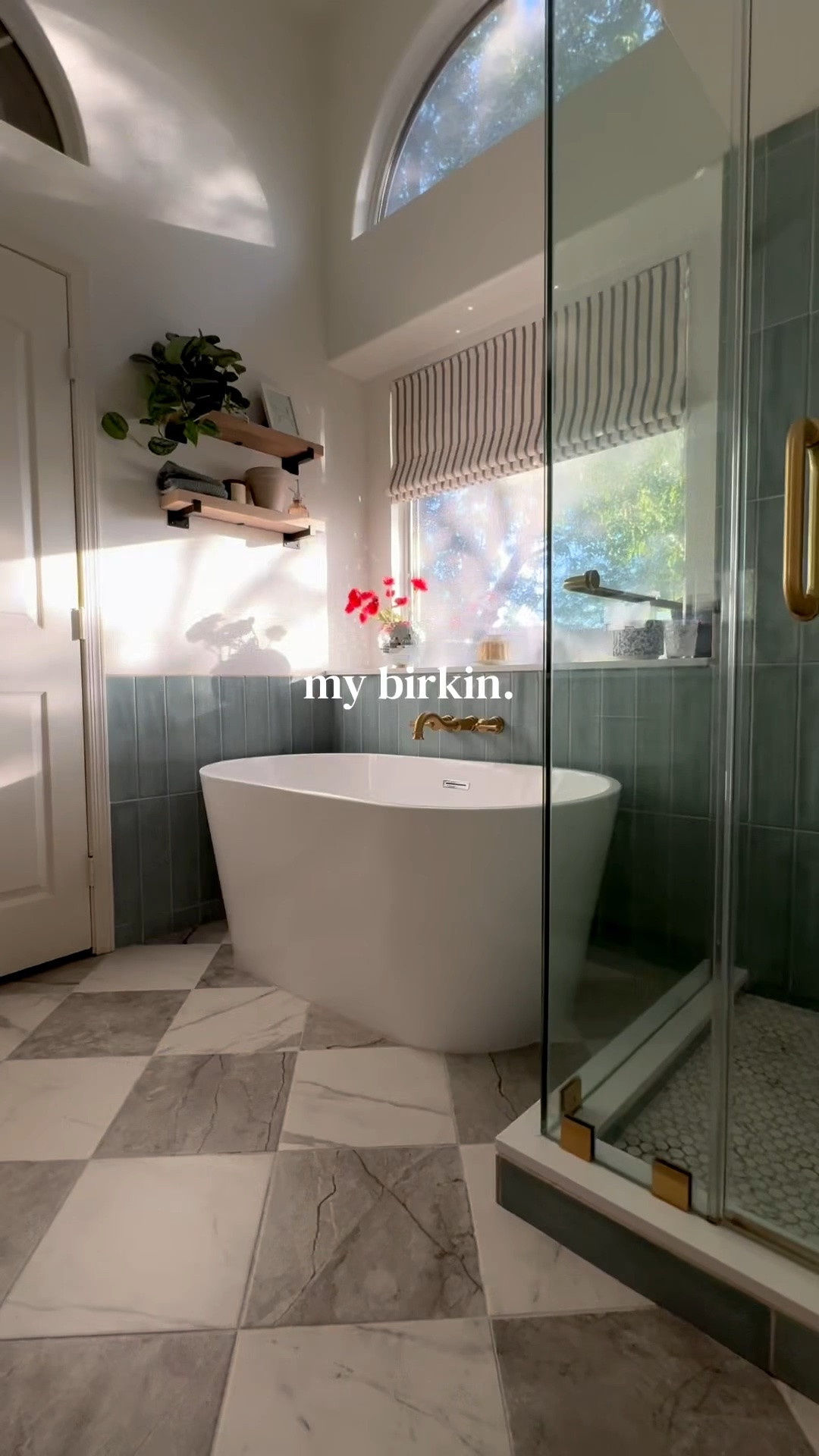 we took our primary bathroom out of the 2000s tuscan era (that brown wall color 👀) and into the whimsy 2020s ✨ i never realized how beautiful the lighting was in this space 🥹 

bathroom ideas, standing tub and shower, combos, blue, shower, tile ideas, checkerboard flooring, checkered tiles, porcelain, checkered tiles, affordable bathroom makeover ￼

#LTKHome #LTKSeasonal #LTKdayinmylife