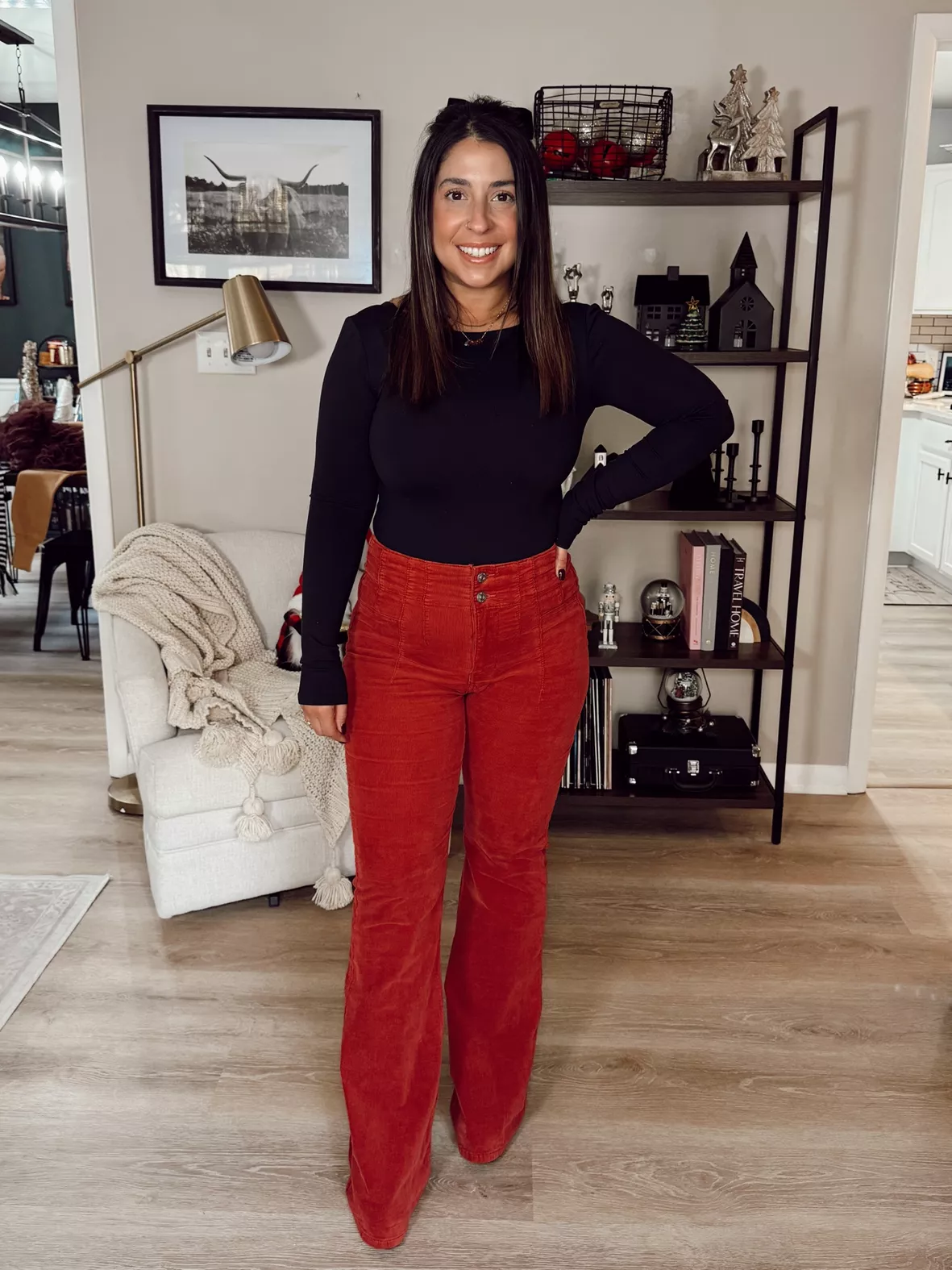 woman wearing red corduroy pants