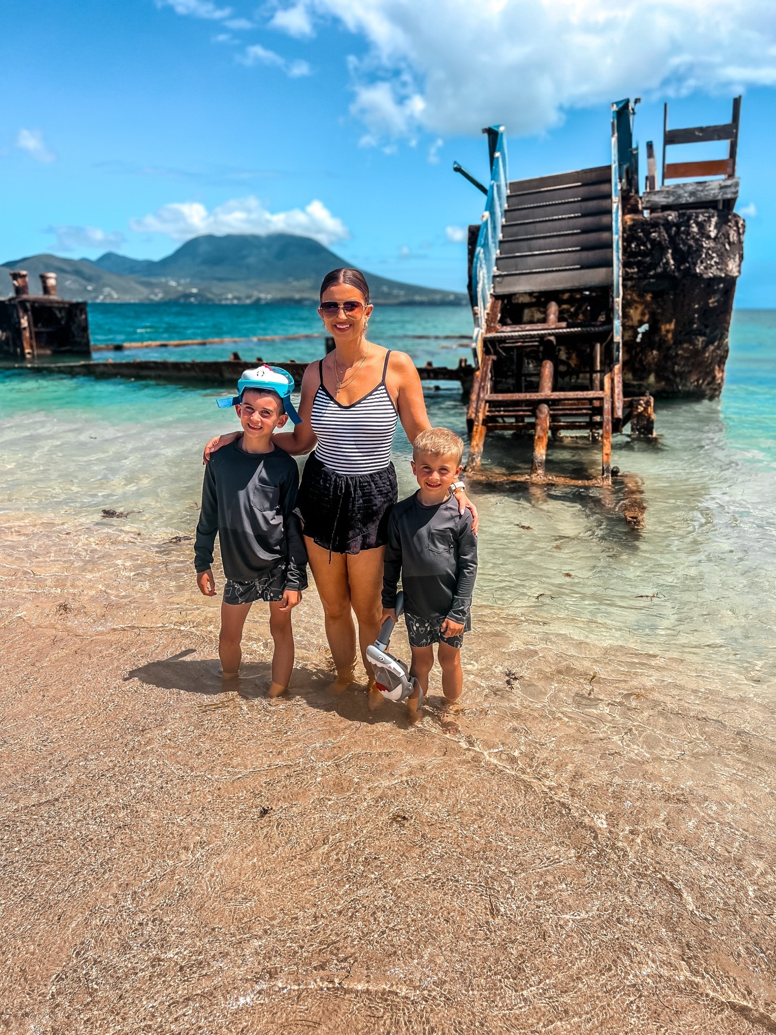 Womens black and white striped one piece swimsuit-medium 
Womens gauze ruffle swim cover up shorts-medium 
Boys dark grey long sleeve rash guard 
Boys neutral black and grey pokemon swim trunks 

#LTKFamily #LTKSwim #LTKKids