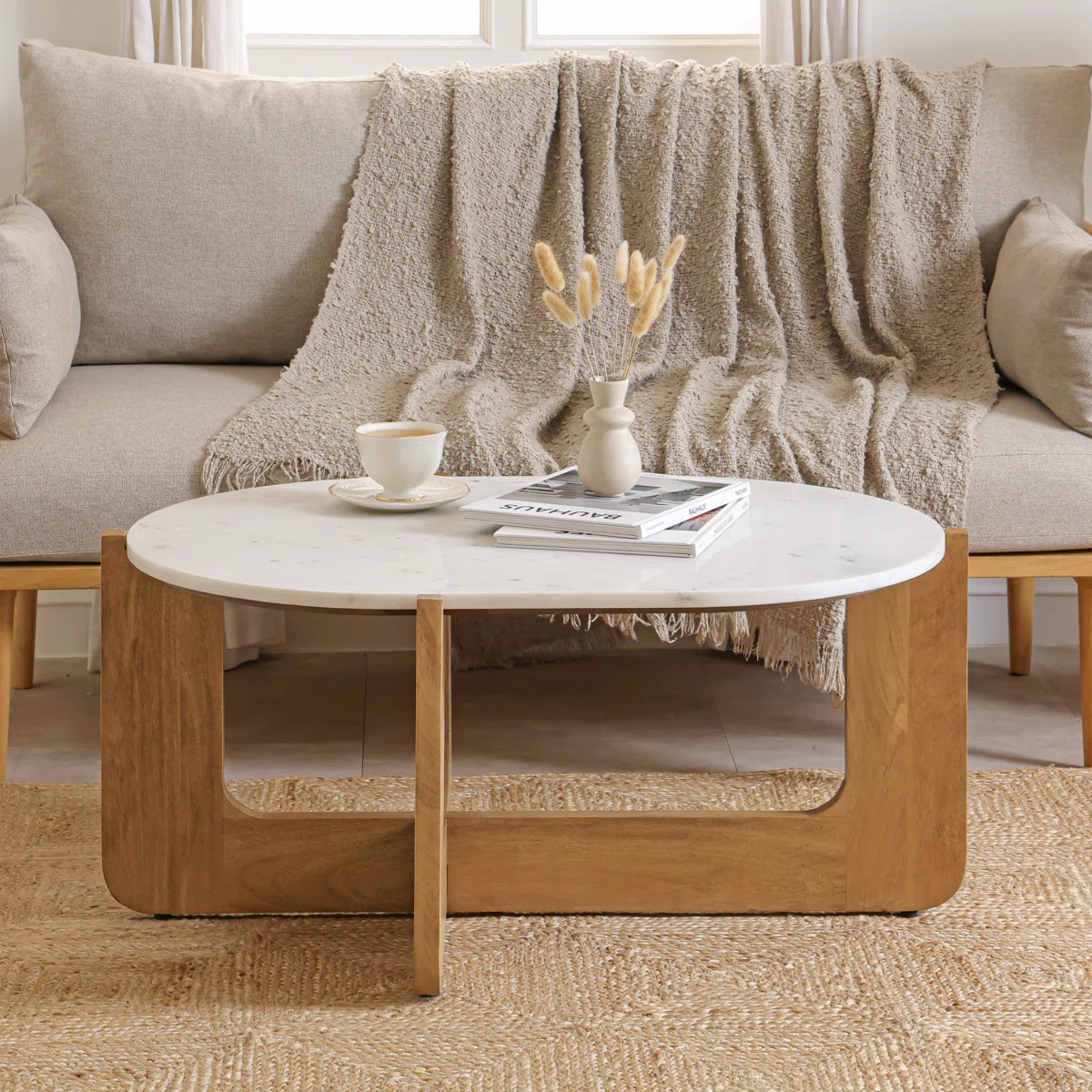 Alden Oval Marble Top Coffee Table with Sculptural Wood Base | Wayfair North America