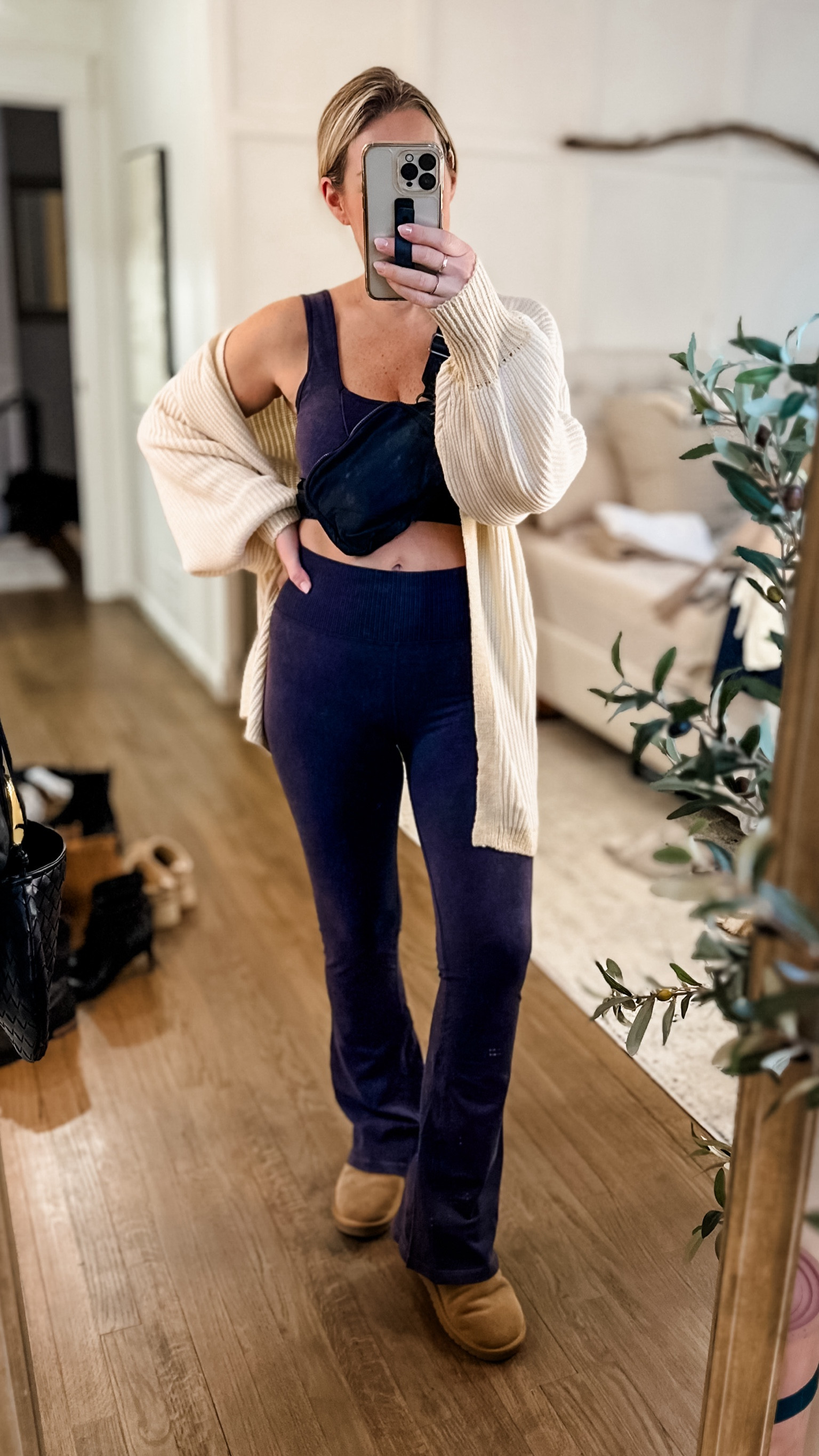 Wearing a M/L in both the bra top and the leggings. These flares make my legs look longer and the ribbed details are so cute and comfy. The material is buttery smooth and so soft and comes in a few colors. This is the navy. These little bags are the best for a quick hands free grab for the essentials; keys, phone, lip balm, debit and a hand lotion! Small Cardi which is also the softest ever! 

#LTKstyletip #LTKfindsunder50 #LTKfitness