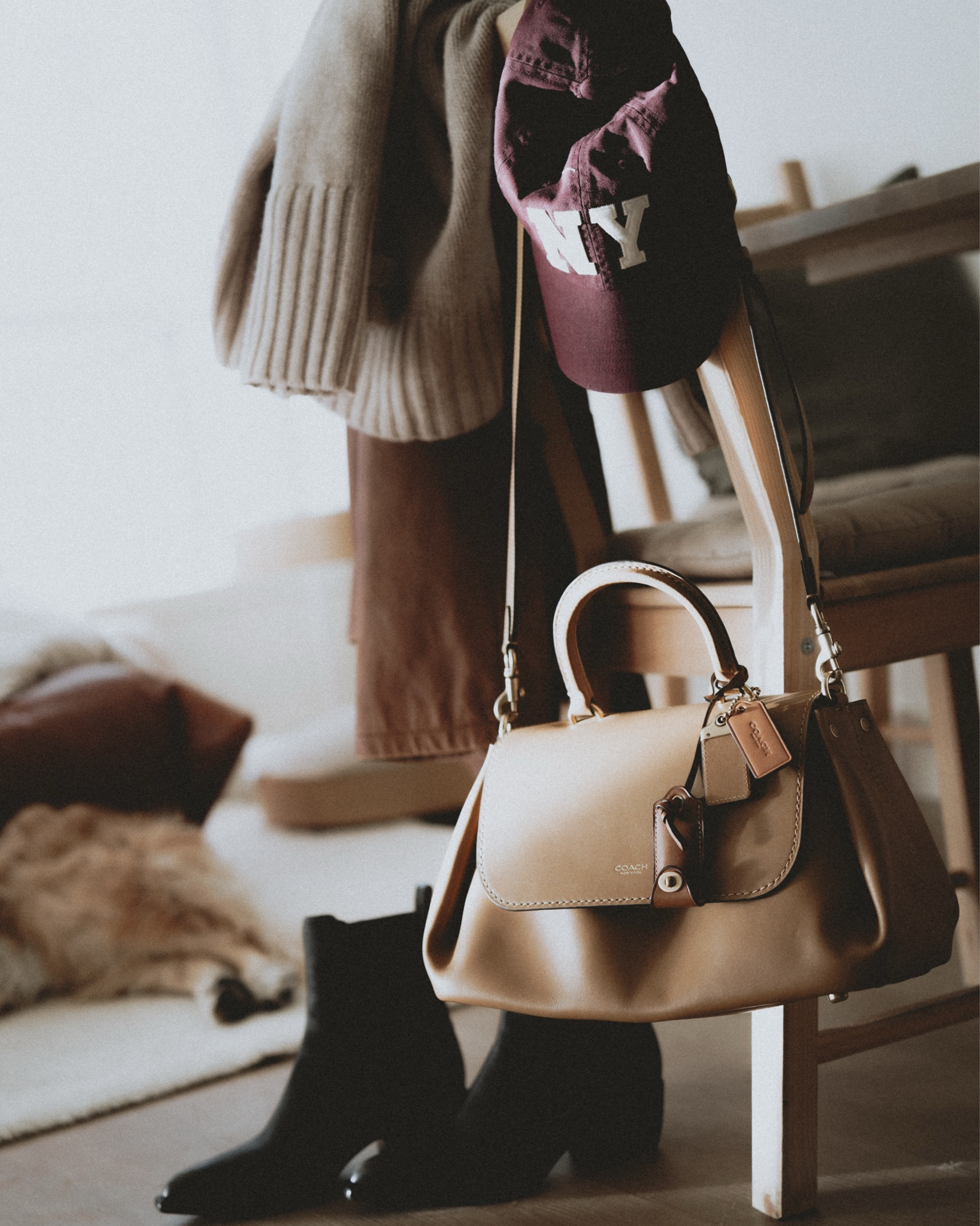 The go-to bag of this Fall: Coach Slouchy Rogue leather satchel bag. 
3 favorite ways to style it:
- with ankle boots + sweatpants + leather jacket + oversized sweater + baseball cap 🧢 
- straight leg jeans + Oxford shirt + utility jacket + western boots
- mini plaid skirt + rollneck sweater + puffer vest + combat boots 
Outfit 1:
Boots: Golden goose Debbie boots 
Oversized cashmere sweater: Cos 
Leather jacket: Gerard Darel
Hat: Ralph Lauren 
Sweatpants: Buck Mason 
Outfit 2:
Jeans: Levi’s 501 90s fit
Boots: Aeyde Ariel
Shirt & utility jacket: Polo Ralph Lauren 
Belt: Buck Mason 
Outfit 3: 
Skirt (skort): Free People 
Sweater: J. Crew 1988 rollneck 
Combat boots: Miu Miu 
Vest: Levi’s 
Outfit 4: 
Boots: Isabel Marant 
Jeans: Levi’s 501 

#LTKStyleTip #LTKItBag #LTKSeasonal