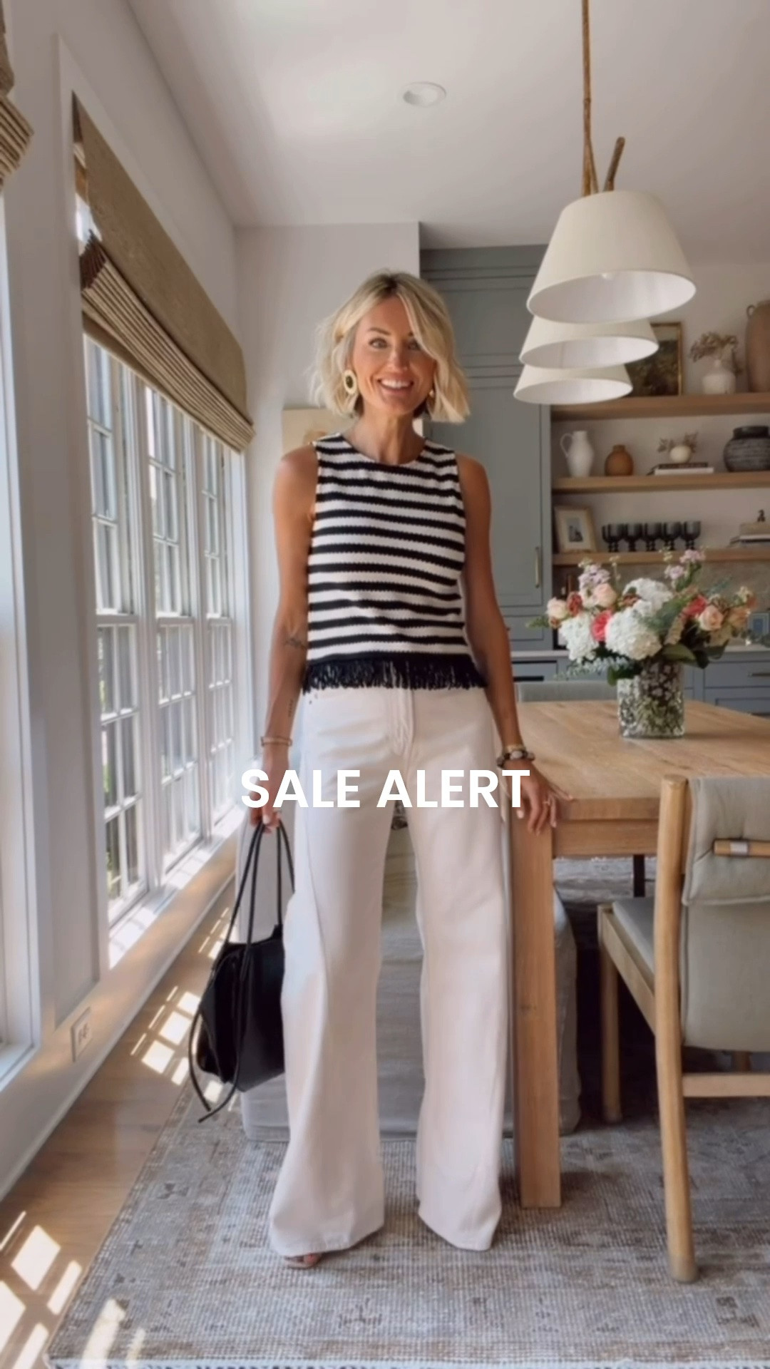 How pretty is this fringe hem striped tank? I love the chic look that this gives and the quality is so good! On sale now for more than 40% off! 👏🏻 wearing small tank, 25 jeans

Loverly grey, Anthropologie sale, fashion finds women, early fall transitional outfit ideas, white jeans, date night outfit

#LTKSeasonal #LTKSaleAlert #LTKootd